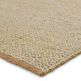 Featuring Laylani Murrel Rug by Jaipur Living at Amethyst Home. Simple and serene, the Laylani Murrel features handwoven natural fiber designs with tonal variation through the solid, chunky weave. The Murrel rug features a 100% jute make in an organic golden-brown colorway. A tightly woven border creates a beautiful finishing touch on this global accent. Amethyst Home provides interior design, new home construction design consulting, vintage area rugs, and lighting in the Newport Beach metro area.