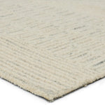 Featuring Lineage Karim Rug by Jaipur Living at Amethyst Home. The Lineage Karim Rug boasts intricate detailing and beautiful texture. A modern take on African and Moroccan motifs, these wool rugs lend pattern and interest with the versatility of neutral tones. The intricate Karim design features an eclectic mesh of stripes and geometric shapes that creates a stunning accent piece. Made of cr. Amethyst Home provides interior design services, furniture, rugs, and lighting in the Seattle metro area.