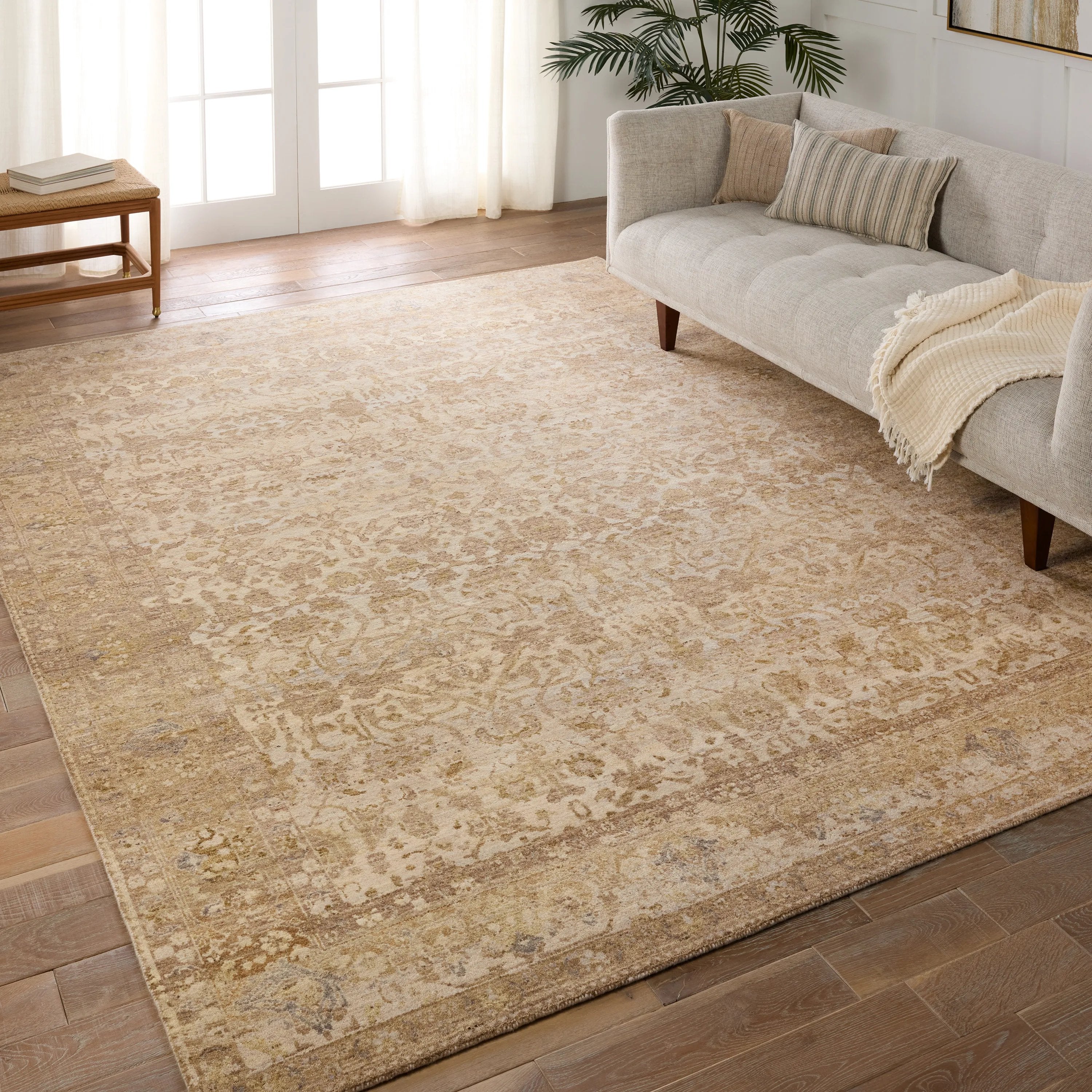 The handknotted Mihret collection gathers inspiration from traditional patterns that offer elegance and a refined, modern colorway. Expertly handcrafted in India with 64 knots per square inch for unparalleled quality, the Zeniba design features traditional floral and scrolling details and a thick border. Amethyst Home provides interior design, new home construction design consulting, vintage area rugs, and lighting in the Dallas metro area.