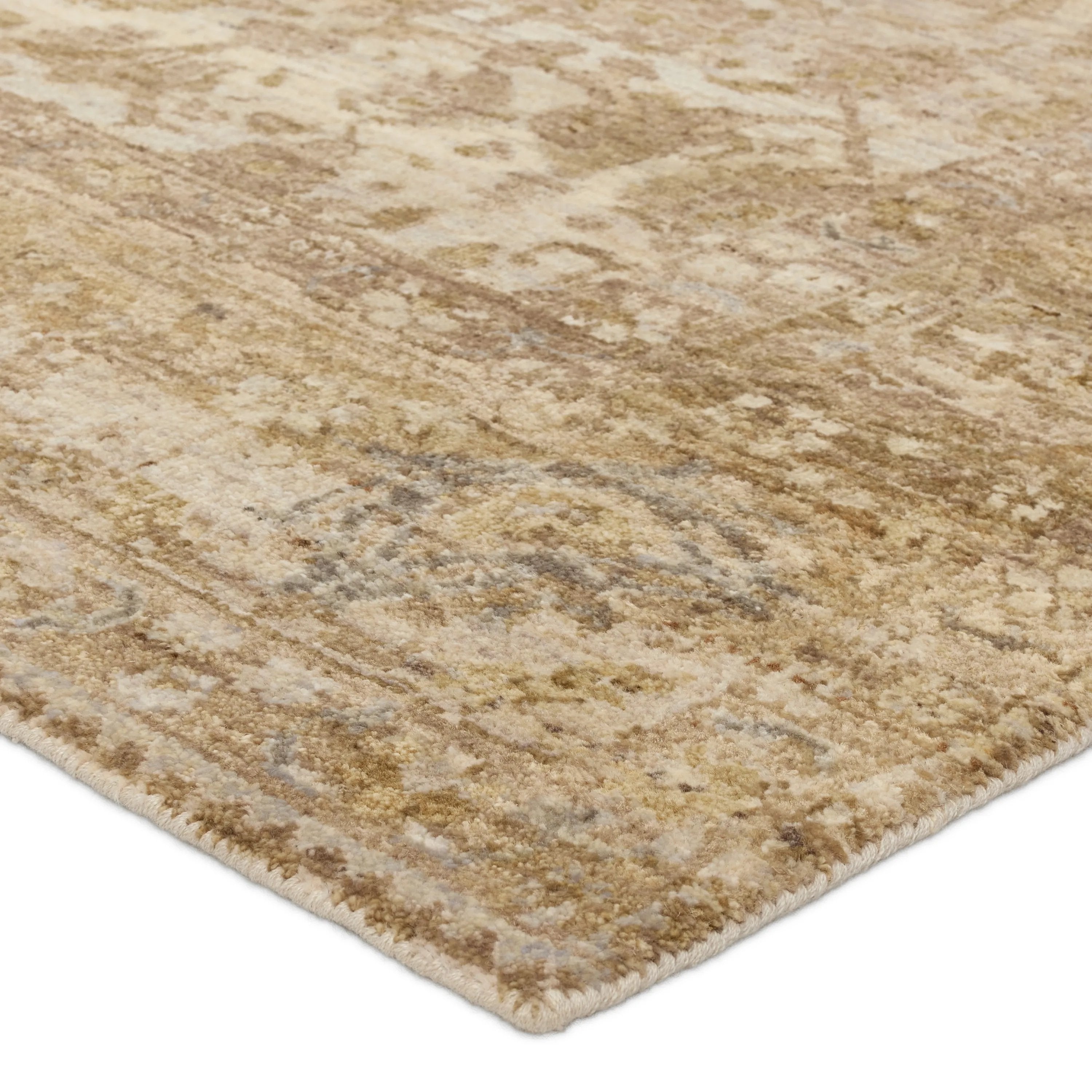 The handknotted Mihret collection gathers inspiration from traditional patterns that offer elegance and a refined, modern colorway. Expertly handcrafted in India with 64 knots per square inch for unparalleled quality, the Zeniba design features traditional floral and scrolling details and a thick border. Amethyst Home provides interior design, new home construction design consulting, vintage area rugs, and lighting in the Los Angeles metro area.