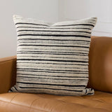 Featuring Montane Dayton Pillow by Jaipur Living at Amethyst Home. The hand-knotted Montane Dayton imbues spaces with modern Moroccan vibes and high-quality craftsmanship. This richly textured assortment of pillows features premium wool and silk blended fibers and an exceptional Persian knot quality. The striped Dayton pillow delights in a cream and black . Amethyst Home provides interior design, new home construction design consulting, vintage area rugs, and lighting in the Des Moines metro area.