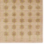 The Onessa Aeston marries traditional motifs with soft, subdued colorways for the perfect blend of fresh and time-honored style. These hand-knotted wool rugs feature a hand-sheared quality that lends the design a coveted vintage impression. The Aeston rug features a distressed tile pattern in hues of brown and tan. Amethyst Home provides interior design, new home construction design consulting, vintage area rugs, and lighting in the Miami metro area.