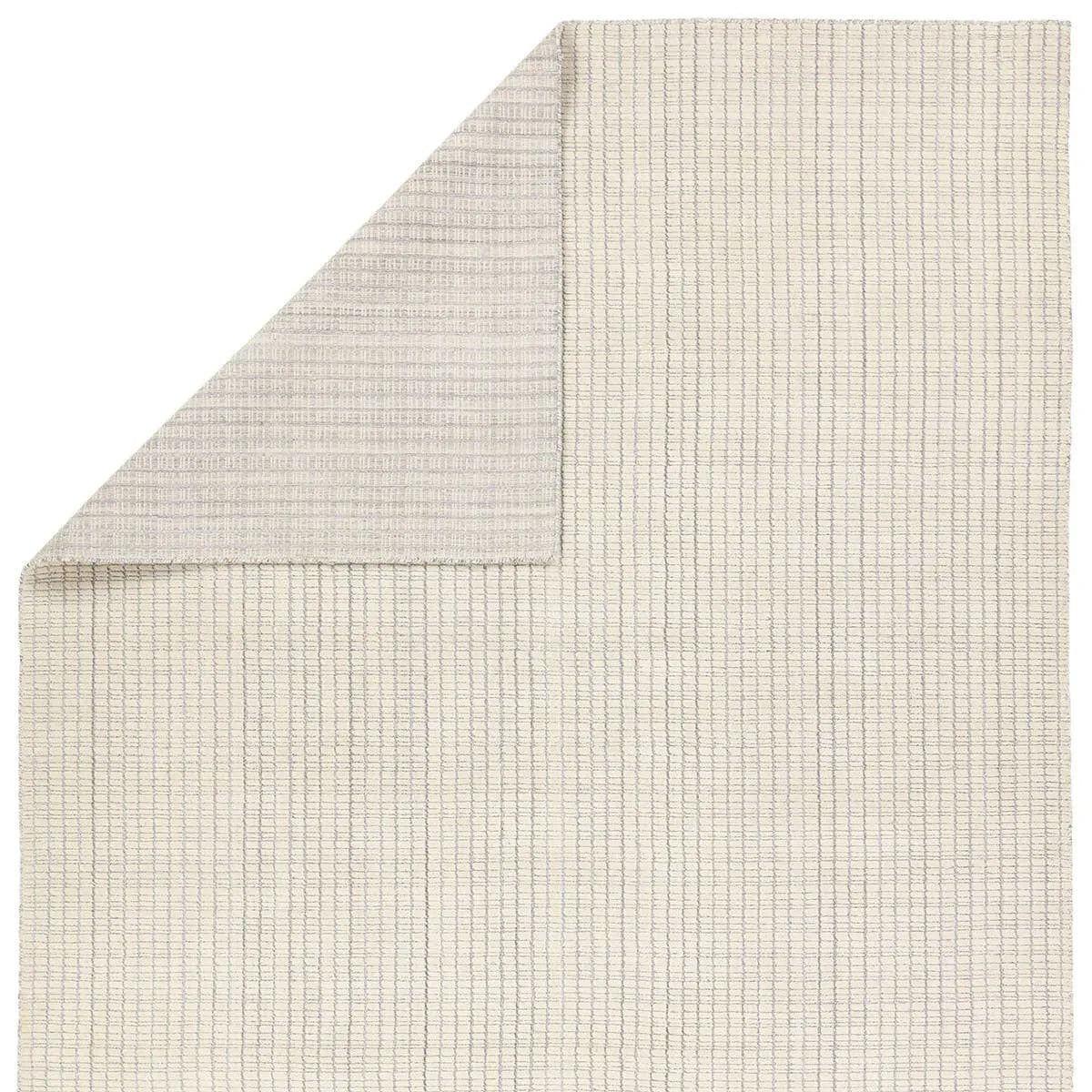 Handwoven in India, the Park City Sundance by Barclay Butera evokes a masculine modernity through neutral-toned grids. The modern Sundance rug showcases a grid in on-trend hues of cream and gray. The cut and looped pile adds texture while maintaining a soft hand. Amethyst Home provides interior design, new home construction design consulting, vintage area rugs, and lighting in the Miami metro area.