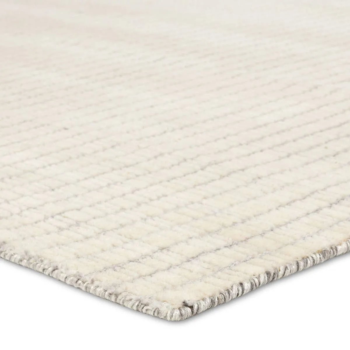 Handwoven in India, the Park City Sundance by Barclay Butera evokes a masculine modernity through neutral-toned grids. The modern Sundance rug showcases a grid in on-trend hues of cream and gray. The cut and looped pile adds texture while maintaining a soft hand. Amethyst Home provides interior design, new home construction design consulting, vintage area rugs, and lighting in the Salt Lake City metro area.
