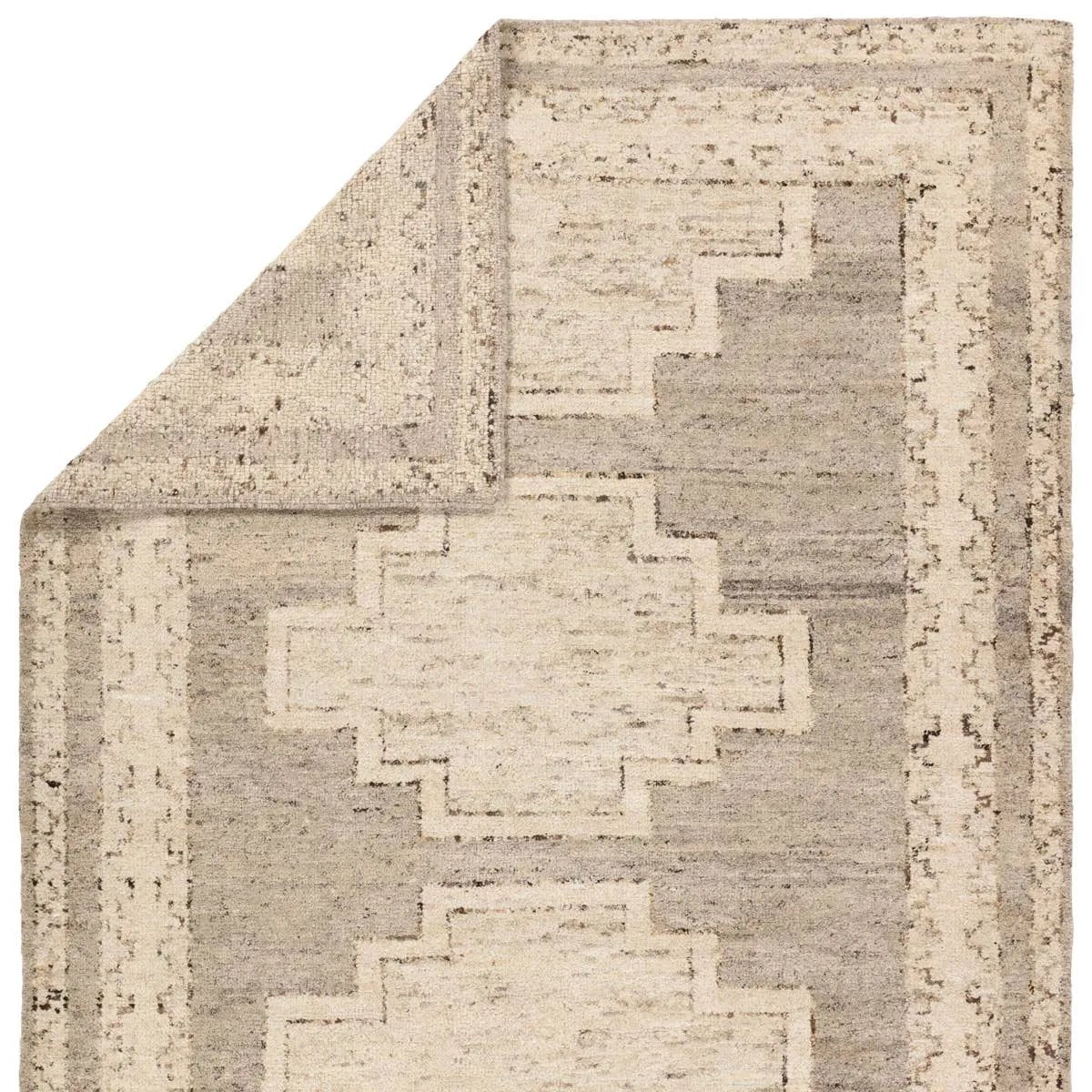 Featuring Repose Achelous Hand-Knotted Rug by Jaipur Living at Amethyst Home. The inviting and traditionally inspired Repose Achelous marries stunning artisan quality and the beauty of natural, undyed wool. The Sherpa-like, hand-knotted construction of the Achelous rug boasts a plush texture underfoot and is perfect for adding warmth and coziness to a space. Th. Amethyst Home provides interior design, new home construction design consulting, vintage area rugs, and lighting in the Tampa metro area.