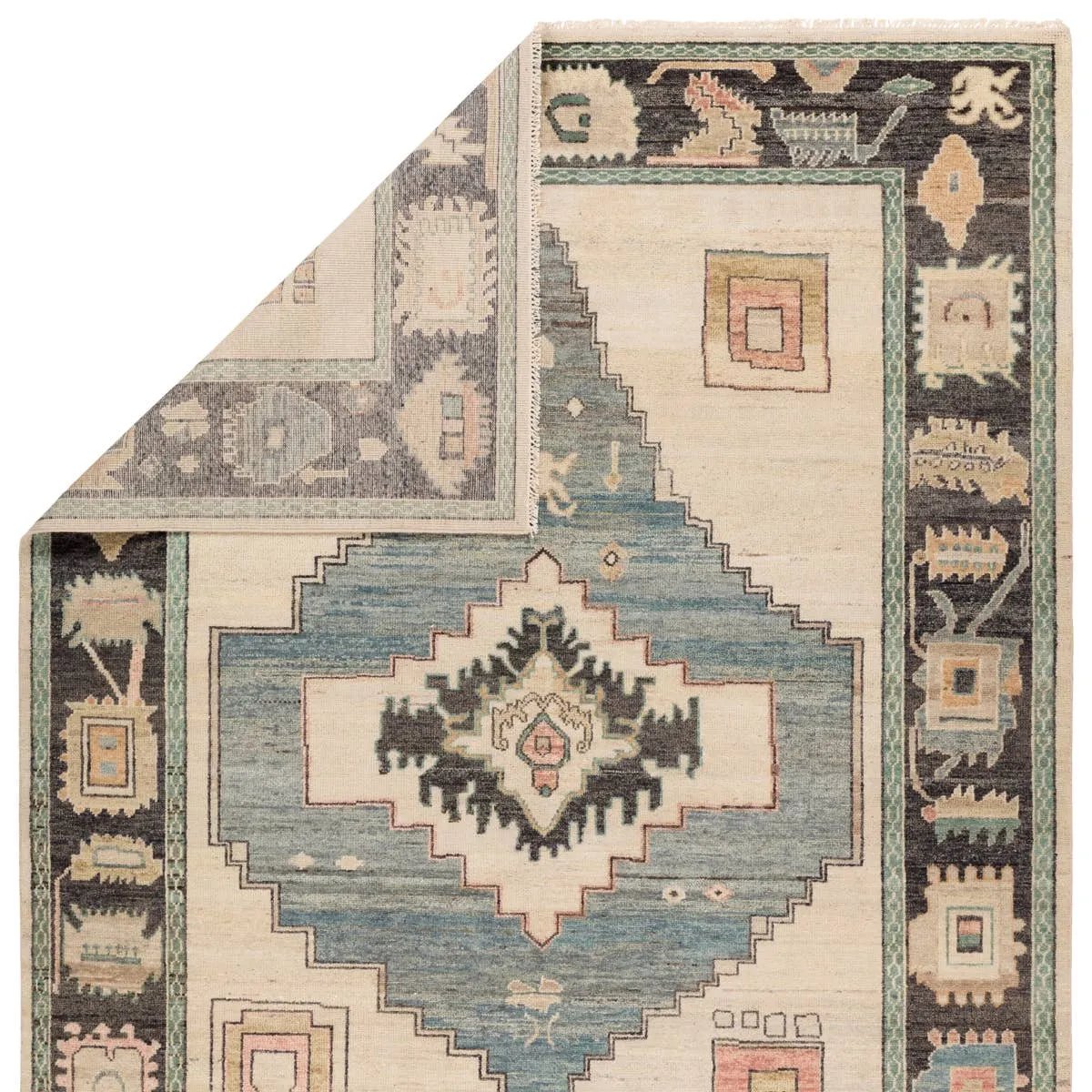 Featuring Reza Enzo Hand-Knotted Rug by Jaipur Living at Amethyst Home. The Reza Enzo is powerful and full of life. Inspired by exotic Oushak designs, it’s rich with color and design bravado. Soft and strong, dense, and lush with an impressive knot count per-square-inch. The Enzo rug stuns with striking design of an updated medallion center that recalls the a. Amethyst Home provides interior design, new home construction design consulting, vintage area rugs, and lighting in the Seattle metro area.