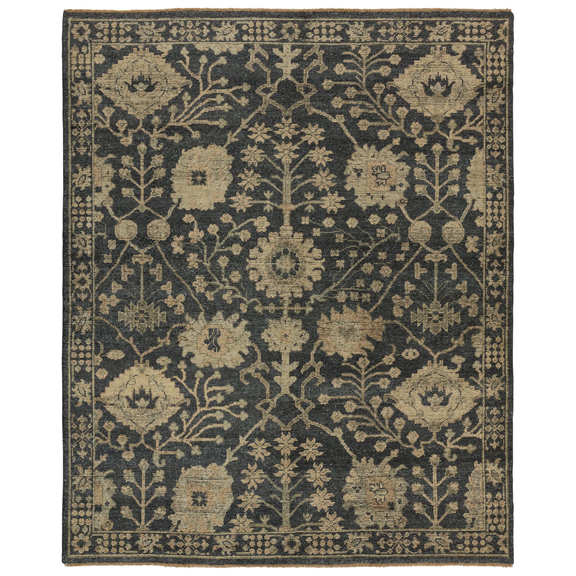 The Rhapsody collection features heirloom-quality designs of stunningly abrashed Old World patterns. The Maeli area rug boasts a beautifully washed Oushak motif with a decorative border. The dark gray tones are accented with khaki, cream, green, and beige hues for added depth and intrigue. This durable wool handknot anchors living spaces with a fresh take on vintage style. Amethyst Home provides interior design, new construction, custom furniture, and area rugs in the Nashville metro area.