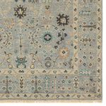 The Rhapsody collection features heirloom-quality designs of stunningly abrashed Old World patterns. The Nysa area rug boasts a beautifully washed floral motif with a decorative border. The blue tone is accented with rich green, tan, navy, and cream hues for added depth and intrigue. This durable wool handknot anchors living spaces with a fresh take on vintage style. Amethyst Home provides interior design, new construction, custom furniture, and area rugs in the Miami metro area.