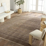 The Rhapsody Kortan features heirloom-quality designs of stunningly abrashed Old World patterns. The Kortan area rug boasts a beautifully distressed mini-medallion motif with a decorative, multi-layered border and geometric detailing. The brown, cream, and tan hues add depth and intrigue. Amethyst Home provides interior design, new home construction design consulting, vintage area rugs, and lighting in the Nashville metro area.