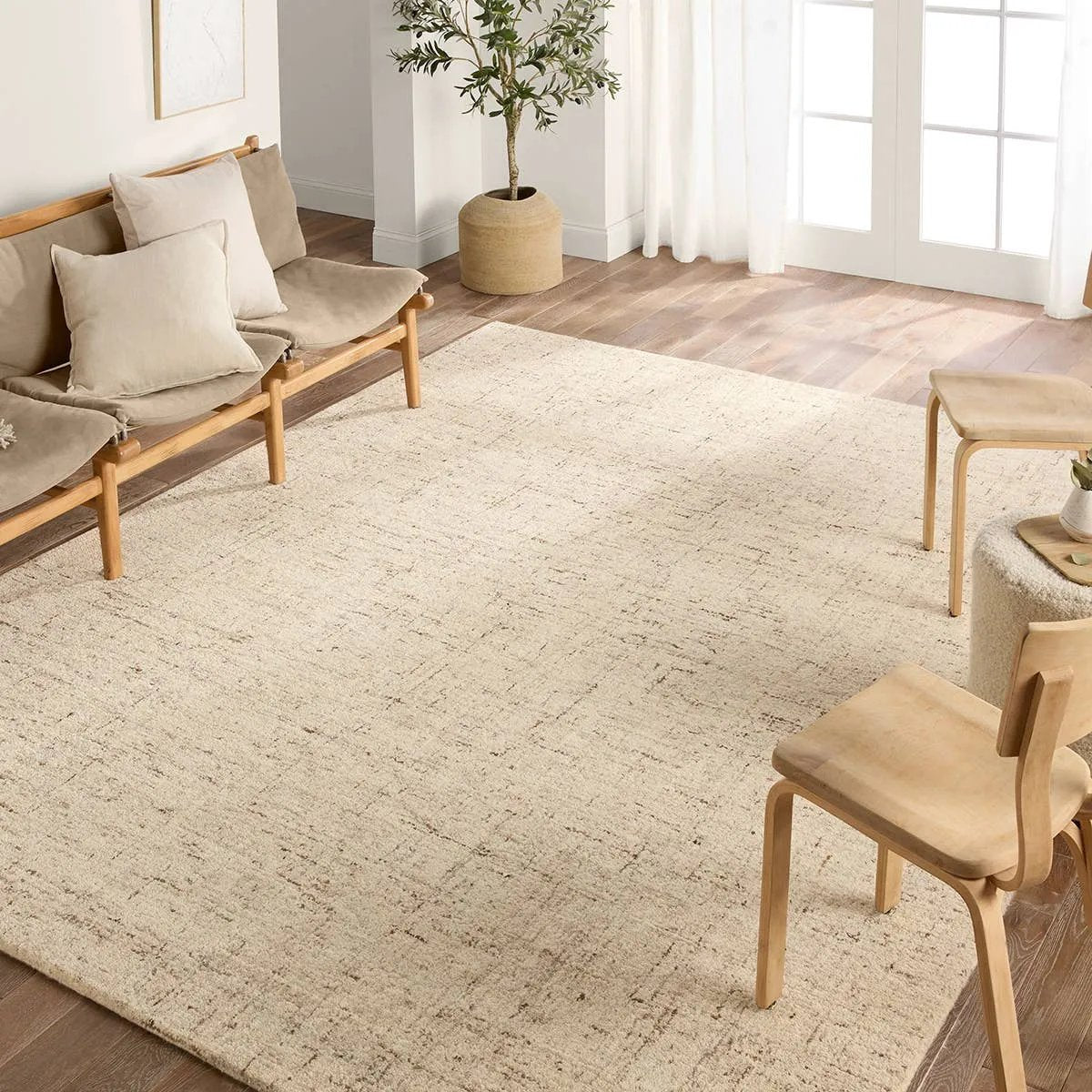 The Salix Macklin boasts an assortment of exceptionally crafted, not-so-solid designs. The hand-tufted Macklin rug features woolen yarn spun by hand with tiny amounts of varied colors. The resulting effect is hyper-textural and perfect for easy, versatile styling. Amethyst Home provides interior design, new home construction design consulting, vintage area rugs, and lighting in the Winter Garden metro area.