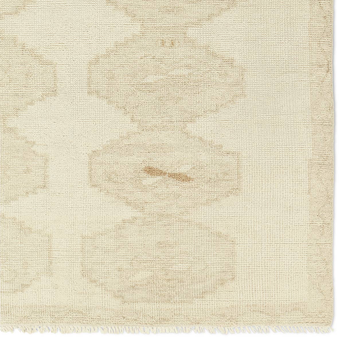 The hand-knotted Sevak Ismail emulates vintage rugs with traditional Turkish patterns, distressing, and a neutral color palette for versatility. The Ismail design features mini-medallions and a subtle border in tones of tan, cream, and brown. Amethyst Home provides interior design, new home construction design consulting, vintage area rugs, and lighting in the Laguna Beach metro area.