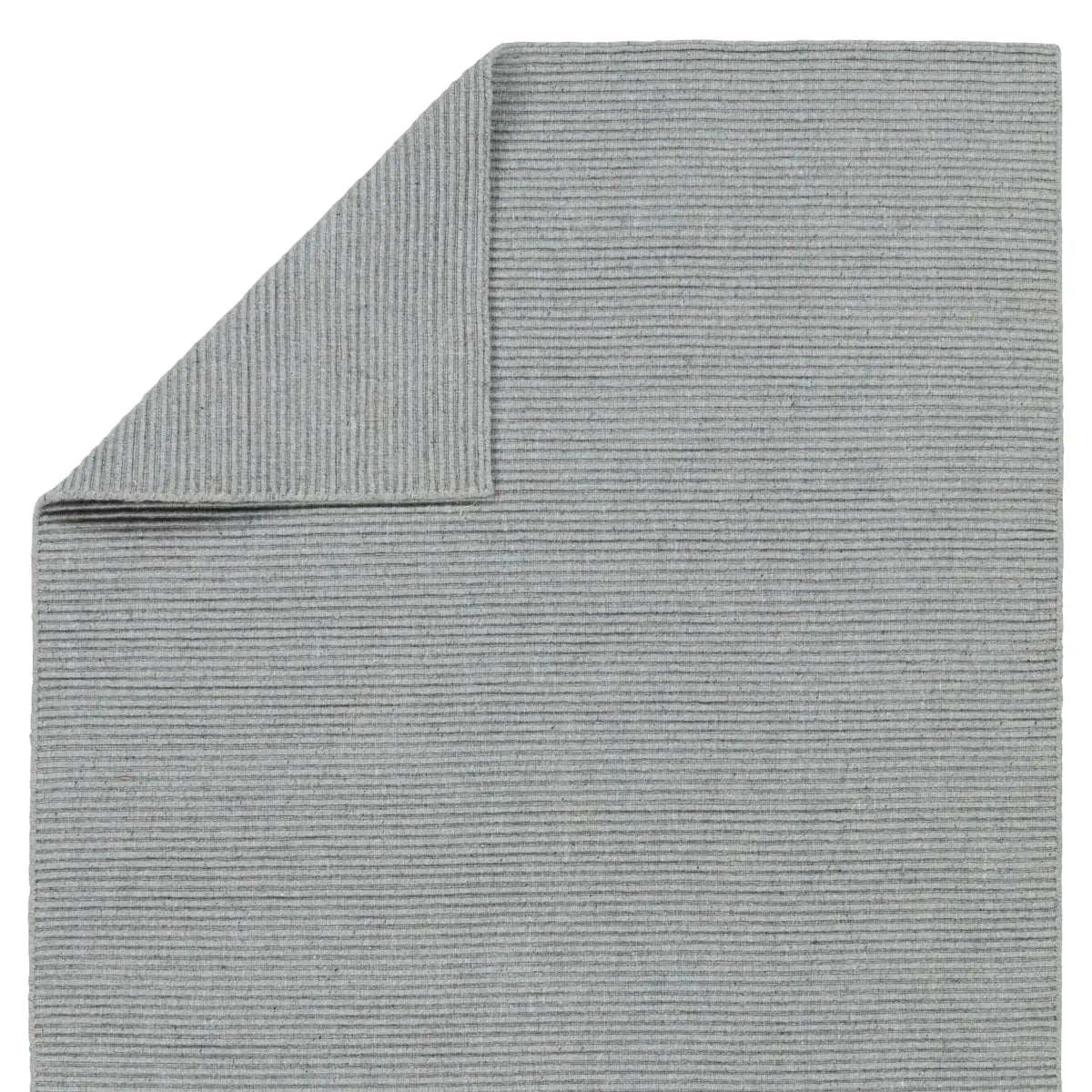 The Strada Shyre Blue Rug features a unique texture and casual comfort that effortlessly grounds spaces with a solid hue. This handwoven wool rug is crafted from undyed yarn for a distinctive, neutral colorway with natural variation for a bit of dimension. Amethyst Home provides interior design services, furniture, rugs, and lighting in the Omaha metro area.