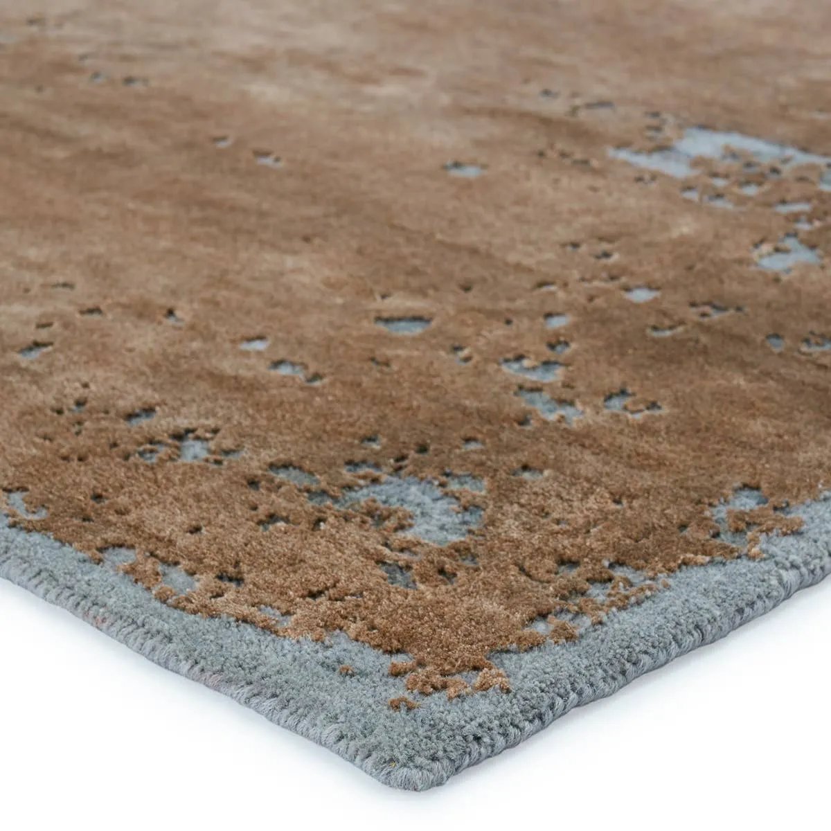 Inspired by the unrushed quality of the natural process, the Urban Pause collection features an assortment of grounding solid designs that are anything but basic. Rayon made from bamboo lends an inviting, silk-like texture and unique light-to-dark effect to the hand-knotted quality. Amethyst Home provides interior design, new home construction design consulting, vintage area rugs, and lighting in the Calabasas metro area.