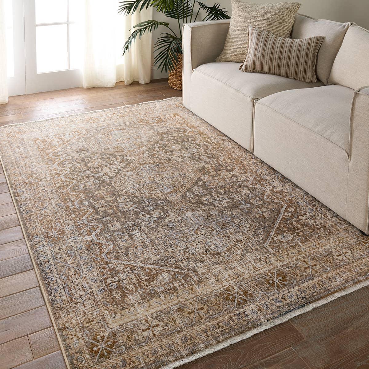 Inspired by the vintage perfection of sun-bathed Turkish designs, the Zefira Zakaria showcases detailed traditional motifs that have been updated with on-trend, saturated colorways. The Zakaria rug boasts a distressed medallion motif in warm tones of tan, taupe, caramel, blue, and green. Amethyst Home provides interior design, new home construction design consulting, vintage area rugs, and lighting in the Dallas metro area.