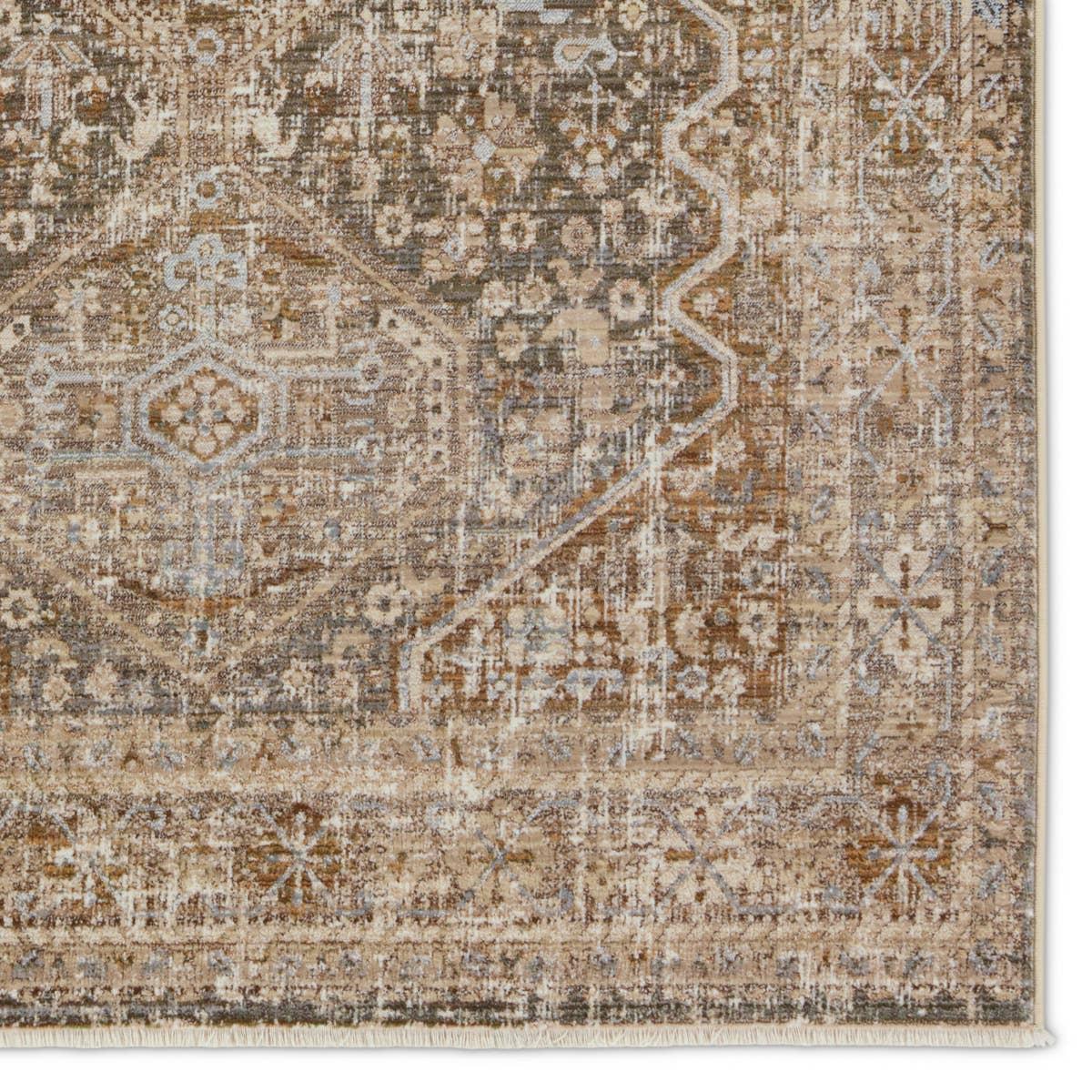 Inspired by the vintage perfection of sun-bathed Turkish designs, the Zefira Zakaria showcases detailed traditional motifs that have been updated with on-trend, saturated colorways. The Zakaria rug boasts a distressed medallion motif in warm tones of tan, taupe, caramel, blue, and green. Amethyst Home provides interior design, new home construction design consulting, vintage area rugs, and lighting in the Kansas City metro area.