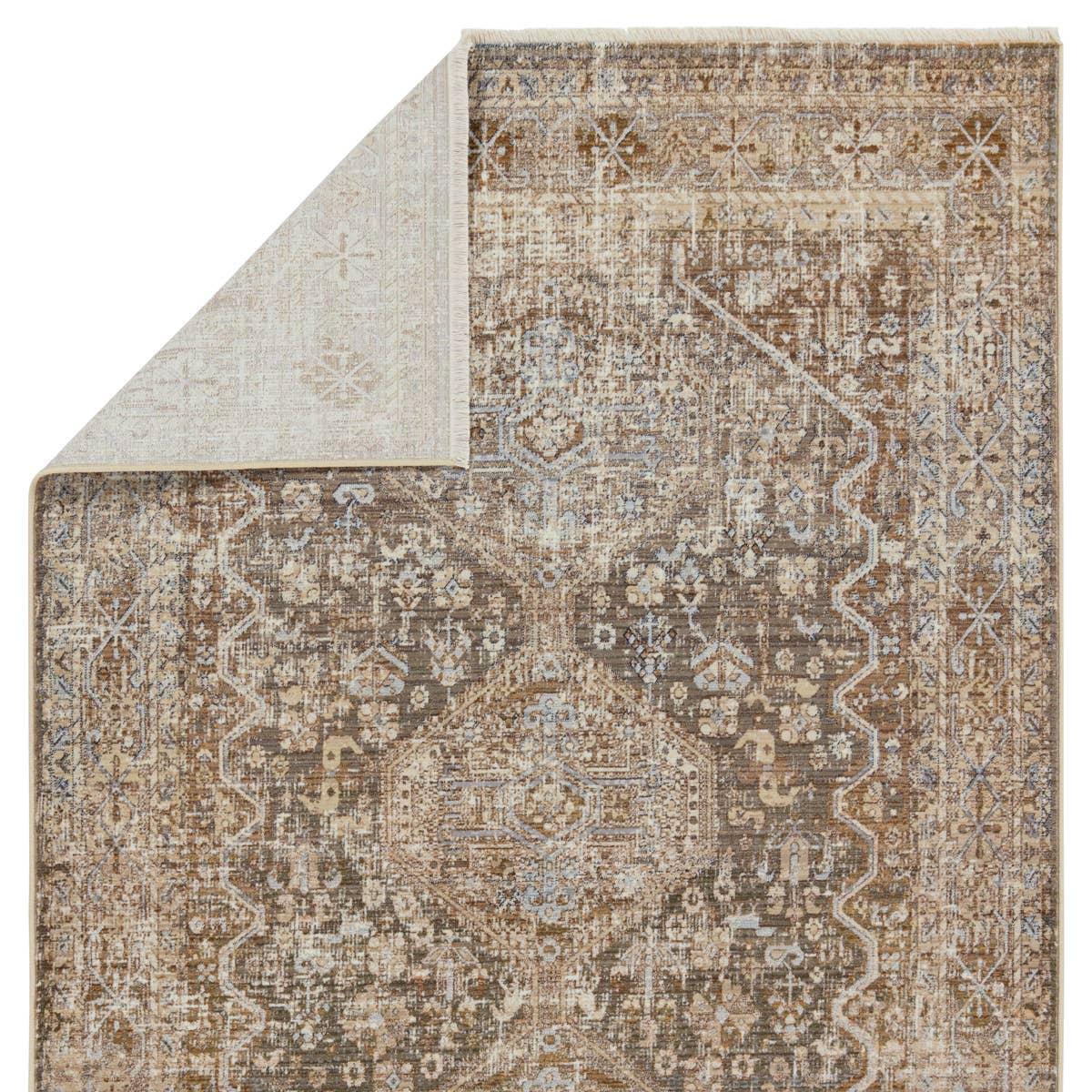 Inspired by the vintage perfection of sun-bathed Turkish designs, the Zefira Zakaria showcases detailed traditional motifs that have been updated with on-trend, saturated colorways. The Zakaria rug boasts a distressed medallion motif in warm tones of tan, taupe, caramel, blue, and green. Amethyst Home provides interior design, new home construction design consulting, vintage area rugs, and lighting in the Washington metro area.