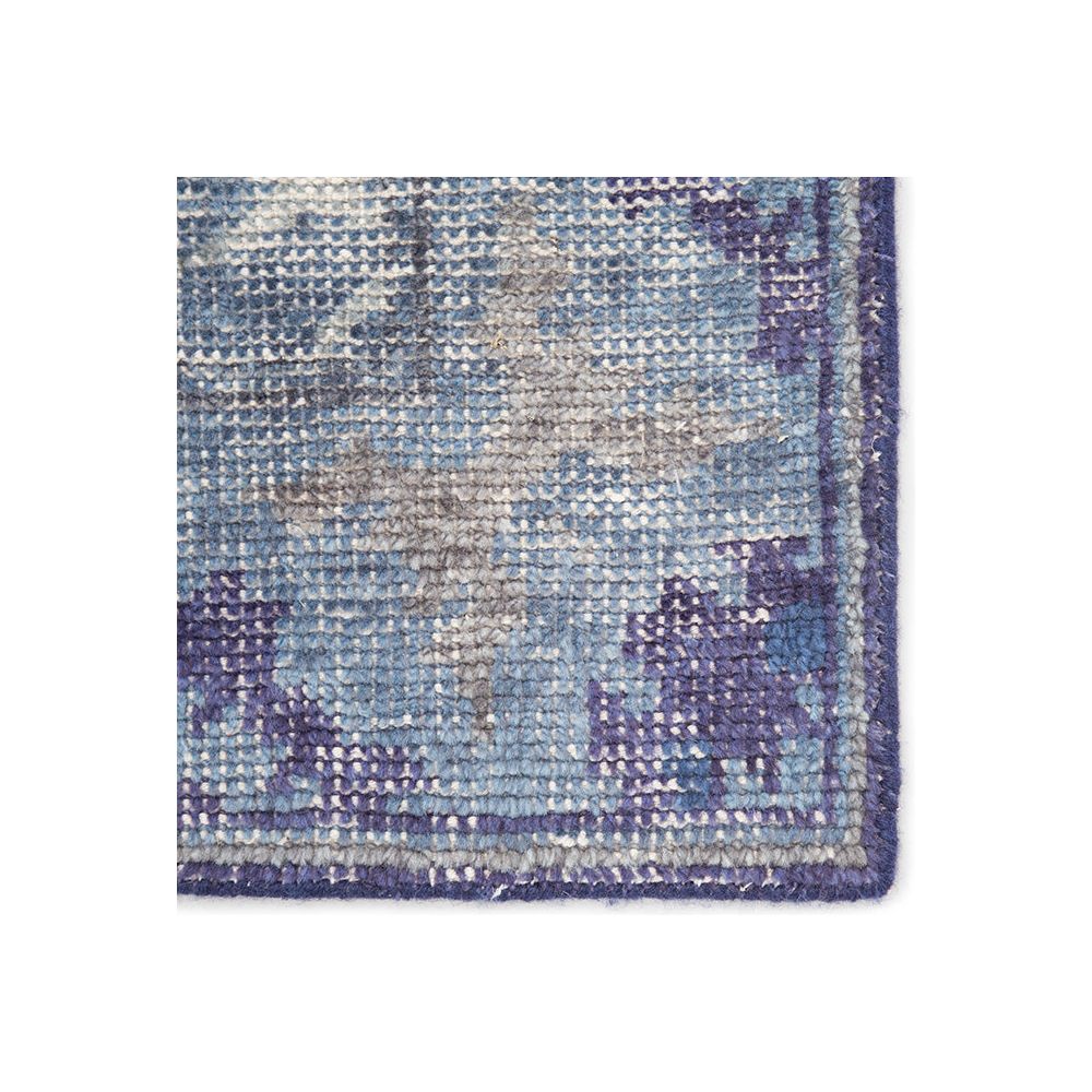 Featuring Kai Moonlight Blue Hand-Knotted Rug by Jaipur Living at Amethyst Home. When a traditional design motif is modernized and imbued with sophisticated shades of Moonlight Blue and Peacoat for a gently aged look, the result can only be called vintage chic. Modify from the new Kai Collection is hand-knotted in 100% wool for exceptional quality and .  Amethyst Home provides interior design, new home construction design consulting, vintage area rugs, and lighting in the Newport Beach metro area.