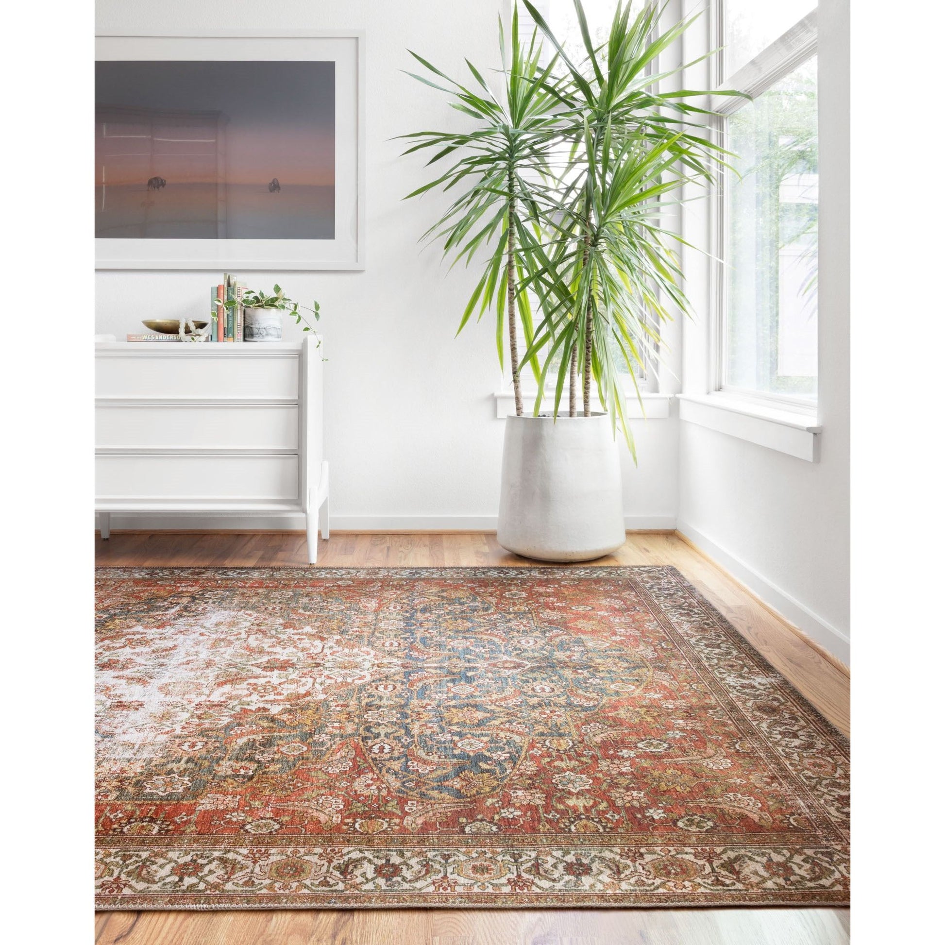 Layla Ocean/Multi Rug - Amethyst Home The Layla Collection is traditional and timeless, with a beautiful lived-in design that captures the spirit of an old-world rug. This traditional power-loomed rug is crafted of 100% polyester with a classic and sophisticated color palette and subtle patina.