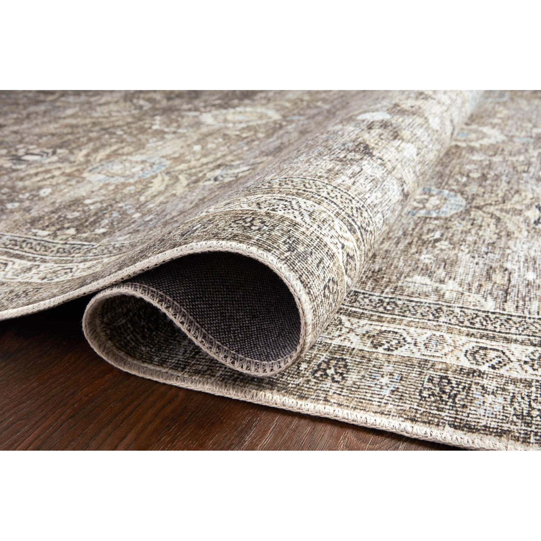 Featuring Layla Antique/Moss Rug by Loloi at Amethyst Home. The Layla Antique / Moss rug from Loloi captures the spirit of an old-world rug. Why is this rug amazing? 

Perfect for families with kids and pets
Very easy to clean and maintain
Comes in big area rug sizes and as cute kitchen and hallway runners
Looks gorgeous with the intricate pattern and pat.  Amethyst Home provides interior design, new home construction design consulting, vintage area rugs, and lighting in the Washington metro area.