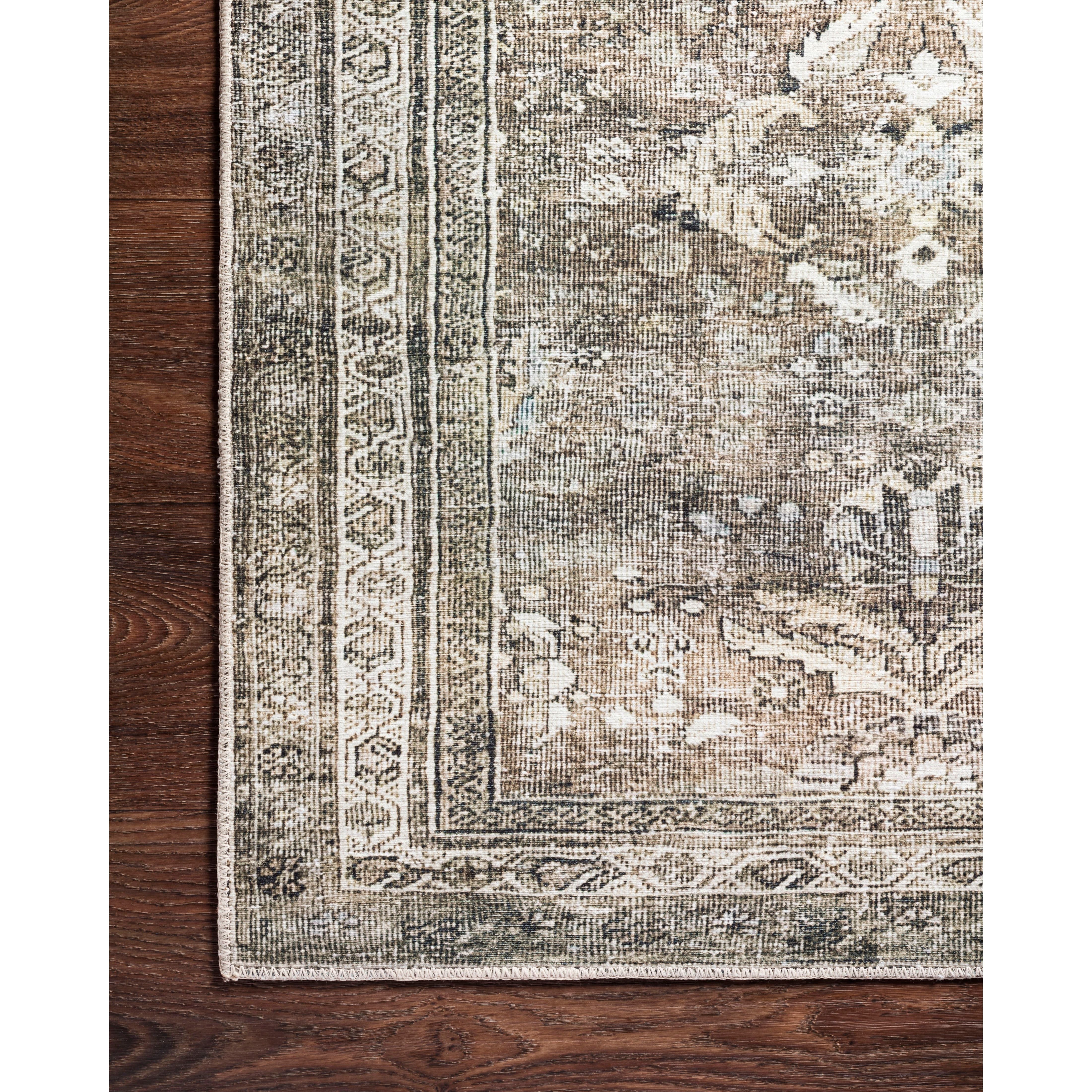 Featuring Layla Antique/Moss Rug by Loloi at Amethyst Home. The Layla Antique / Moss rug from Loloi captures the spirit of an old-world rug. Why is this rug amazing? 

Perfect for families with kids and pets
Very easy to clean and maintain
Comes in big area rug sizes and as cute kitchen and hallway runners
Looks gorgeous with the intricate pattern and patina.  Amethyst Home provides interior design, new home construction design consulting, vintage area rugs, and lighting in the Seattle metro area.