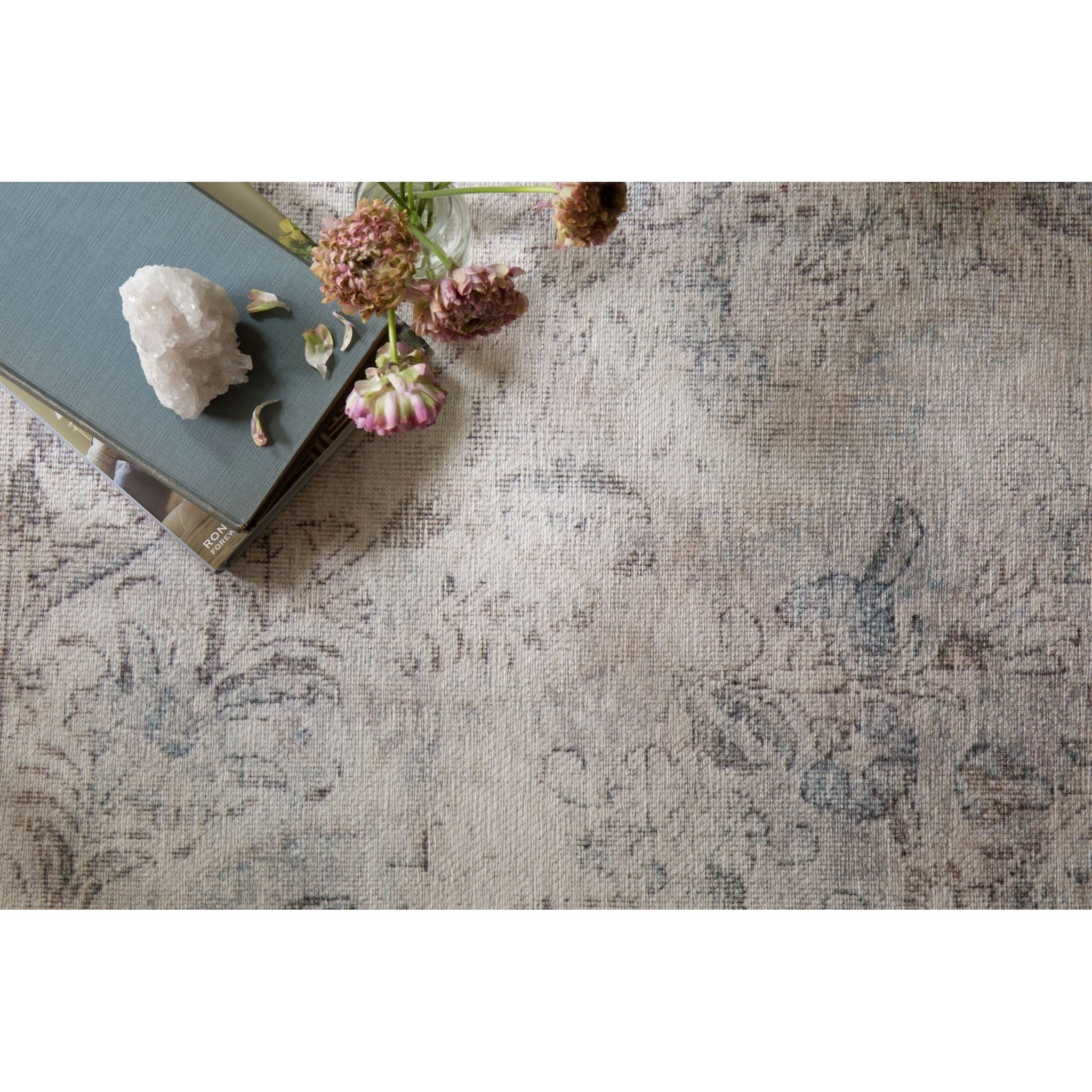 Loren Silver/Slate Rug - Amethyst Home Timeless and classic, the Loren Collection offers vintage hand-knotted looks at an affordable price. Created in Turkey using the most advanced rug-making technology, these printed designs provide a textured effect by portraying every single individual knot on a soft polyester base.