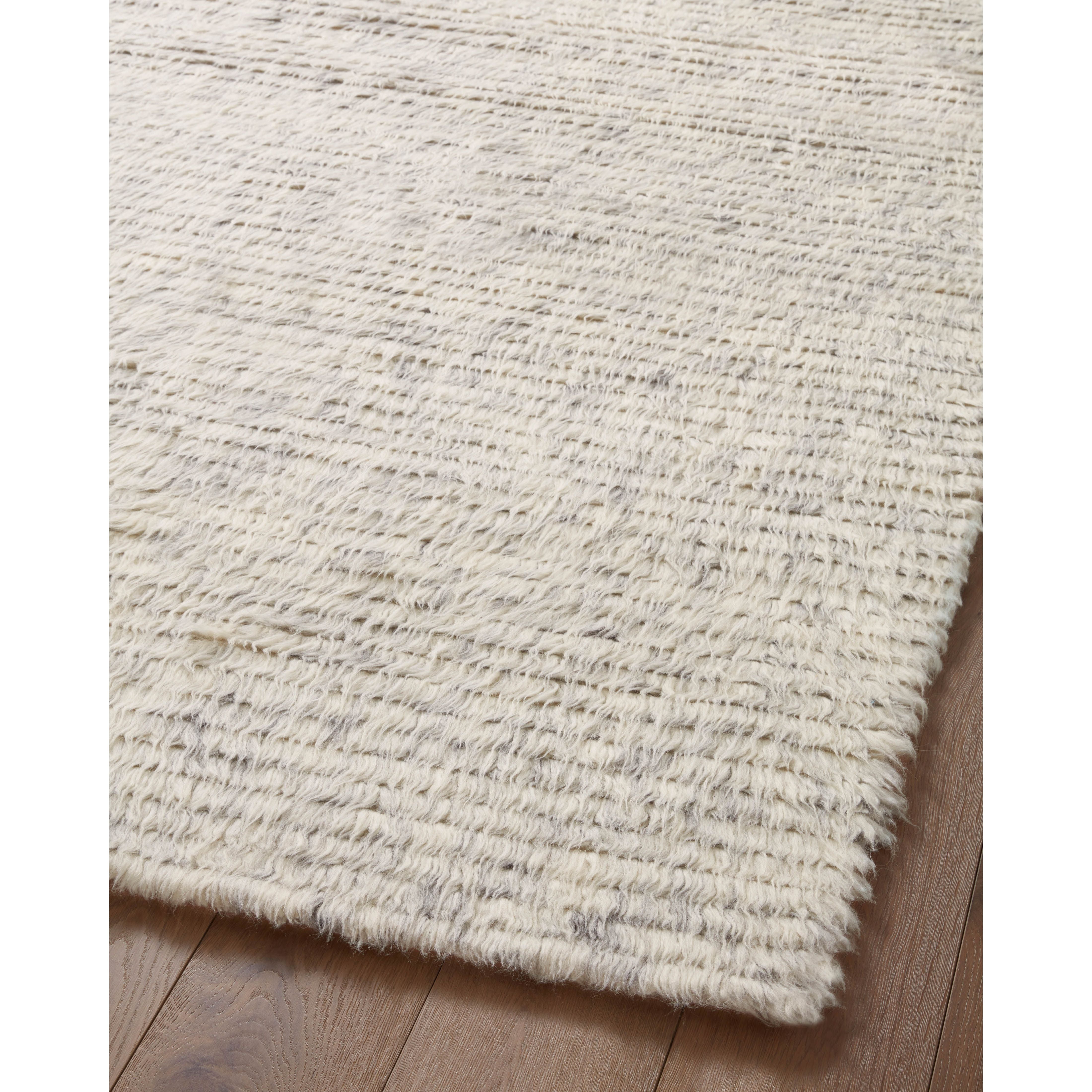 The Amber Lewis x Loloi Woodland Silver Rug has a lush, soft pile inspired by the tree-lined city of Woodland, California. A slightly ridged construction adds dimension and movement to this stylish, modern rug. Amethyst Home provides interior design services, furniture, rugs, and lighting in the Kansas City metro area.