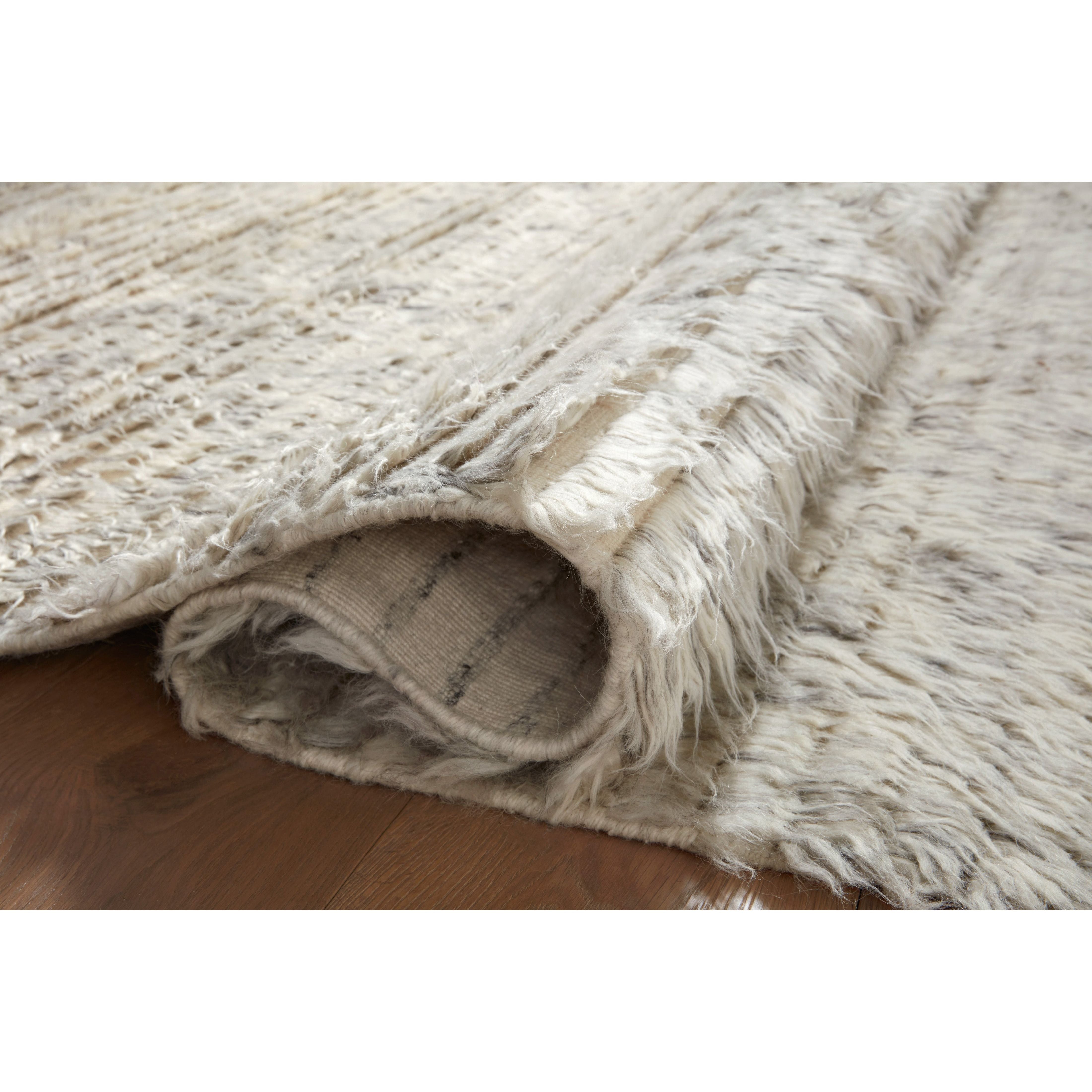 The Amber Lewis x Loloi Woodland Silver Rug has a lush, soft pile inspired by the tree-lined city of Woodland, California. A slightly ridged construction adds dimension and movement to this stylish, modern rug. Amethyst Home provides interior design services, furniture, rugs, and lighting in the Miami metro area.
