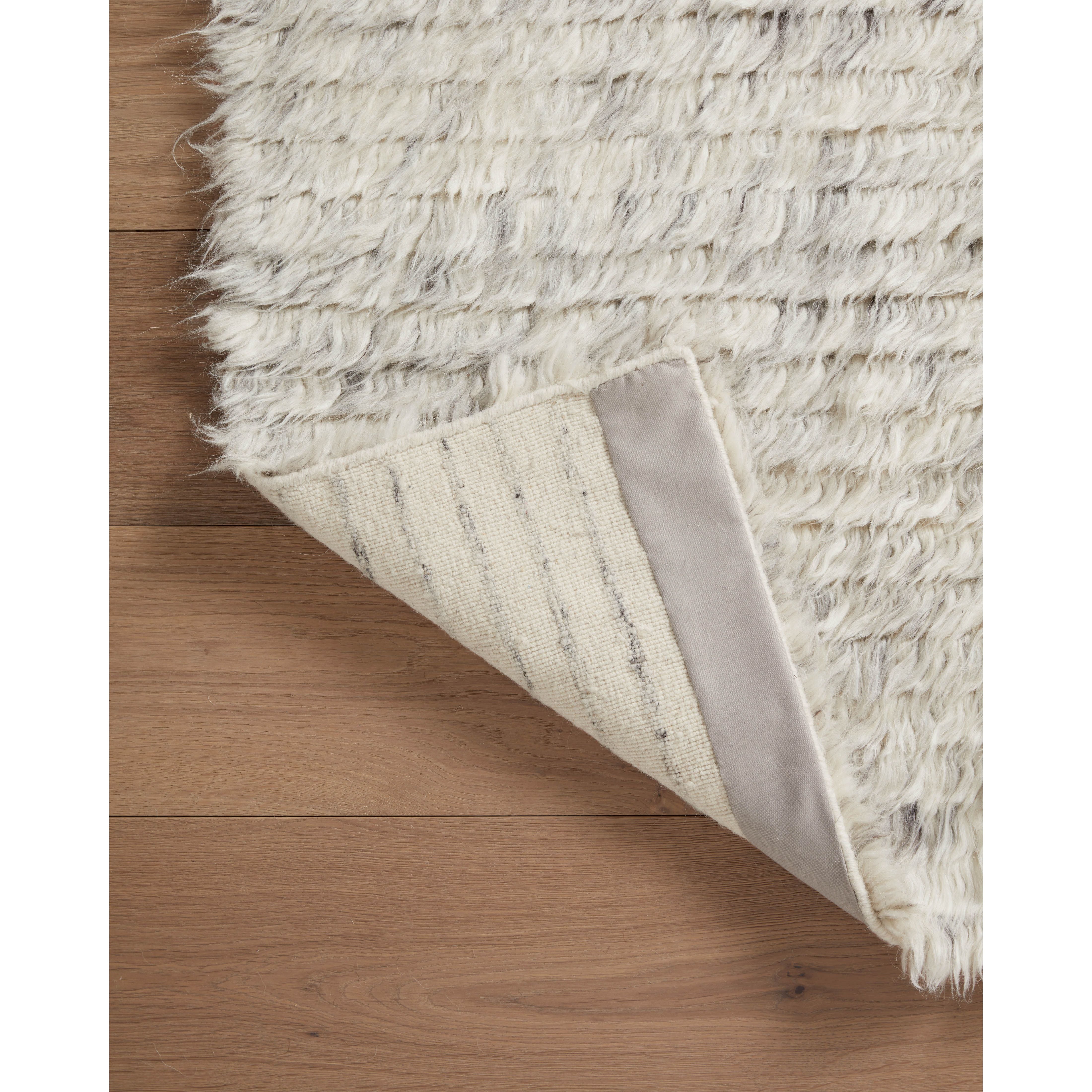 Featuring Amber Lewis x Loloi Woodland Silver Rug by Loloi at Amethyst Home. The Amber Lewis x Loloi Woodland Silver Rug has a lush, soft pile inspired by the tree-lined city of Woodland, California. A slightly ridged construction adds dimension and movement to this stylish, modern rug. Hand-knotted by artisans in India, the Woodland Collection is GoodWeave certified, ensuring our commitment to. Amethyst Home provides interior design services, furniture, rugs, and lighting in the Omaha metro area.