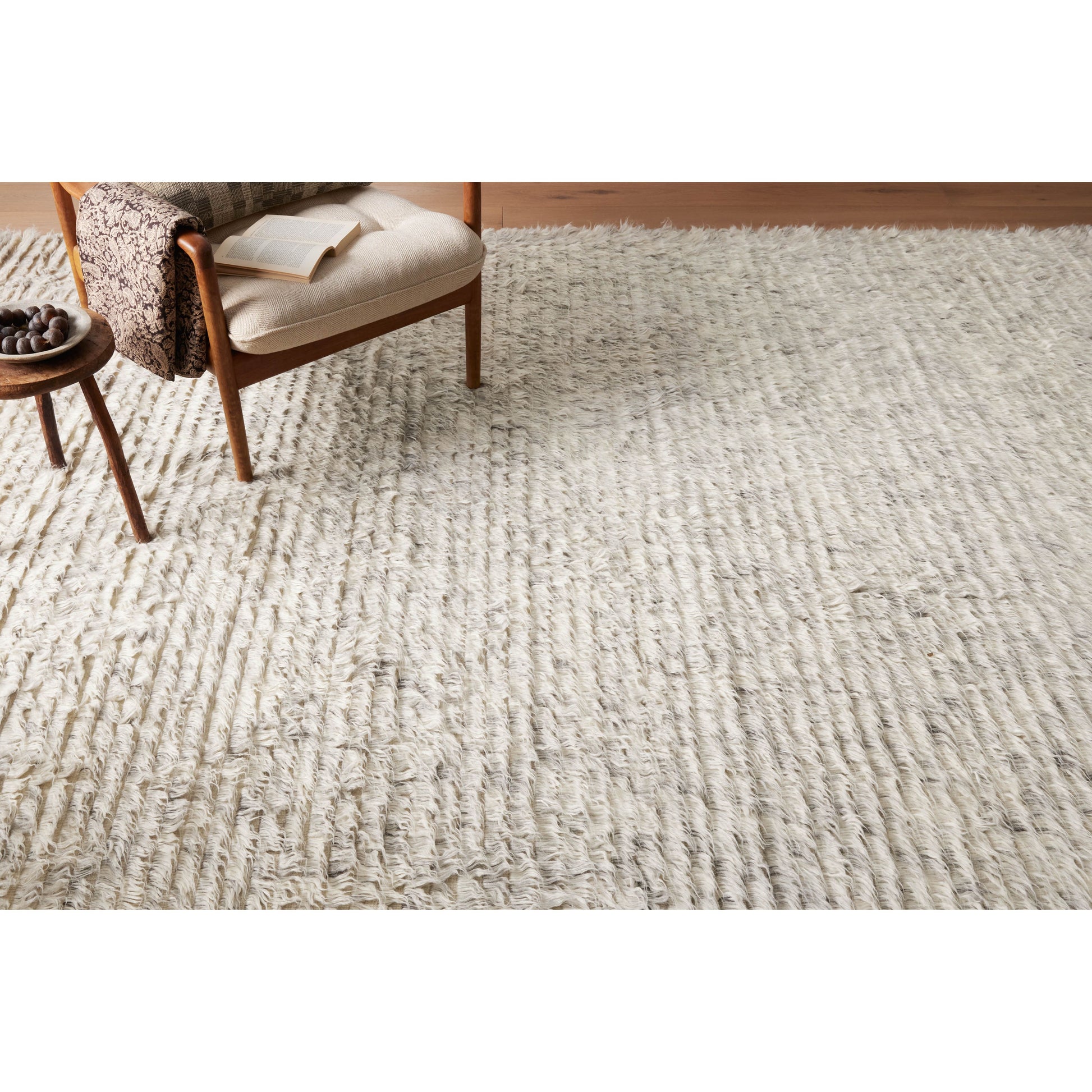 The Amber Lewis x Loloi Woodland Silver Rug has a lush, soft pile inspired by the tree-lined city of Woodland, California. A slightly ridged construction adds dimension and movement to this stylish, modern rug. Amethyst Home provides interior design services, furniture, rugs, and lighting in the Salt Lake City metro area.