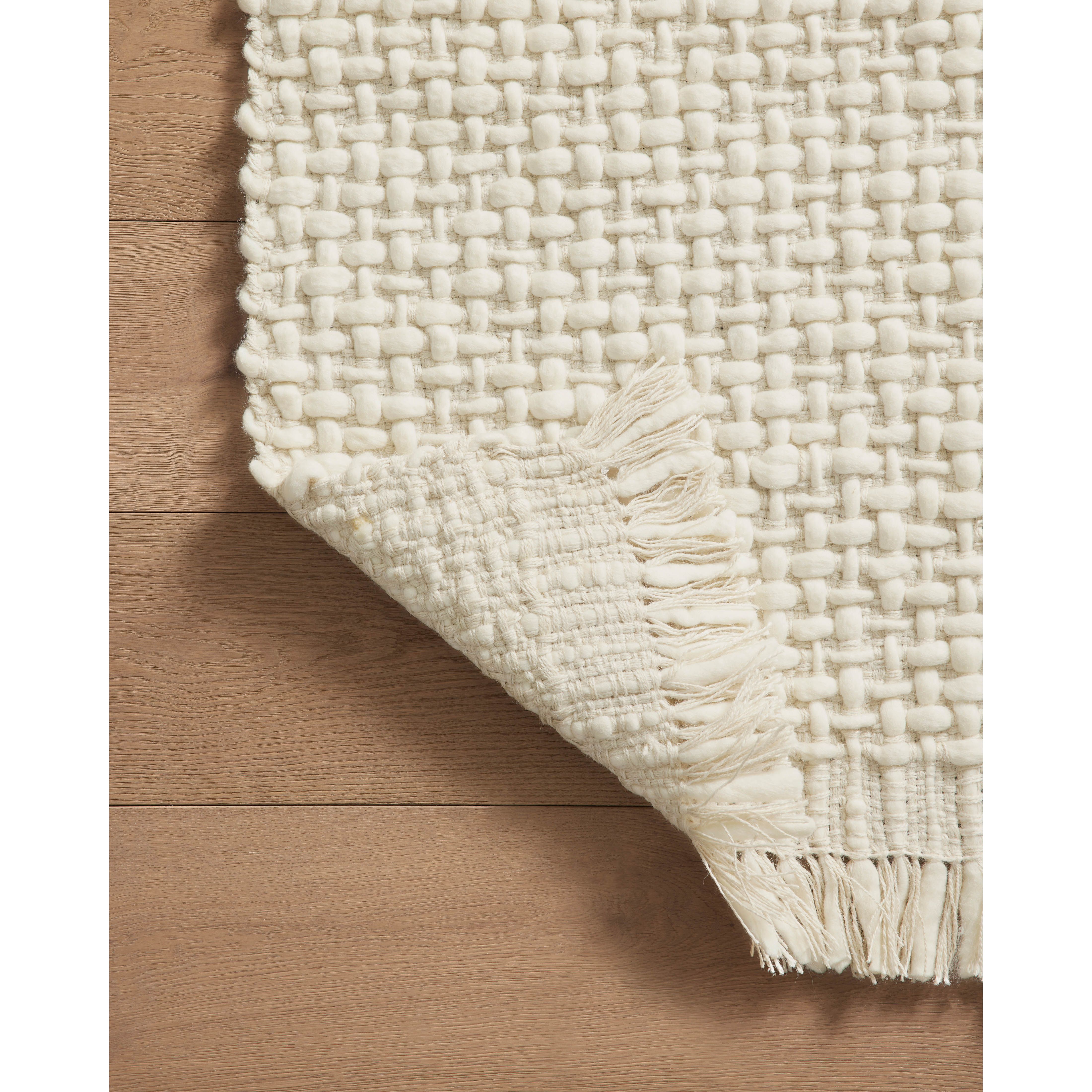 Featuring Amber Lewis x Loloi Yellowstone Ivory / Ivory Rug by Loloi at Amethyst Home. Taking cues from the stunning rock formations and varied landscape of the country’s oldest national park, the Amber Lewis x Loloi Yellowstone Ivory / Ivory Rug is made of interwoven wool and jute for a pebbled yet soft, durable rug in natural tones. Hand-woven by artisans in India, this Amber Lewis × Lolo. Amethyst Home provides interior design services, furniture, rugs, and lighting in the Calabasas metro area.