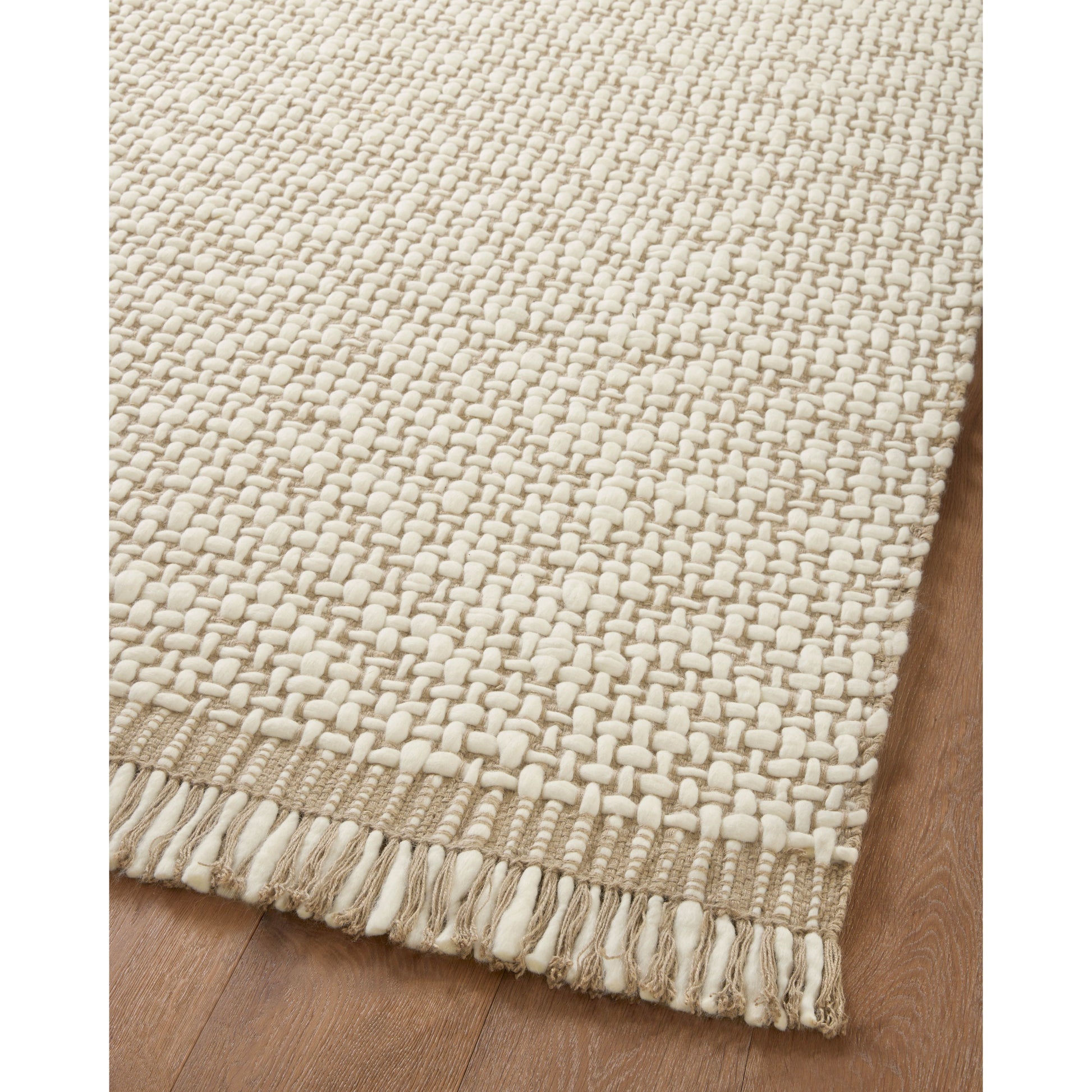Taking cues from the stunning rock formations and varied landscape of the country’s oldest national park, the Amber Lewis x Loloi Yellowstone Natural / Ivory Rug is made of interwoven wool and jute for a pebbled yet soft, durable rug in natural tones. Amethyst Home provides interior design services, furniture, rugs, and lighting in the Austin metro area.
