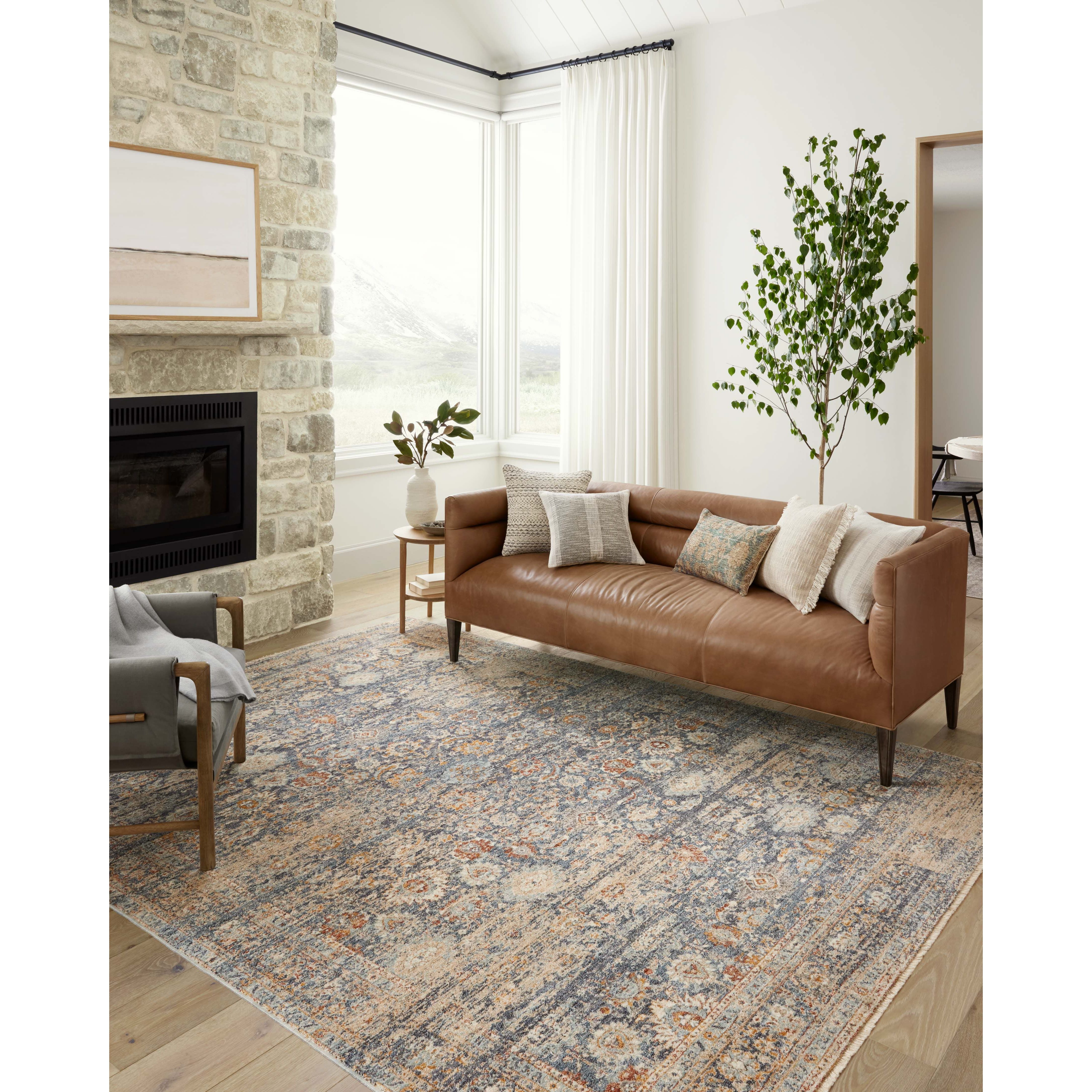 Designed in an expertly distressed antique style, the Angela Rose x Loloi Blake Navy / Multi rug features traditional motifs that have softened into the background, making it an effortless neutral in any room. Muted earth-toned palettes complement a range of furniture, while subtle cream-colored fringe at the edges add texture and framing. Amethyst Home provides interior design services, furniture, rugs, and lighting in the Omaha metro area.