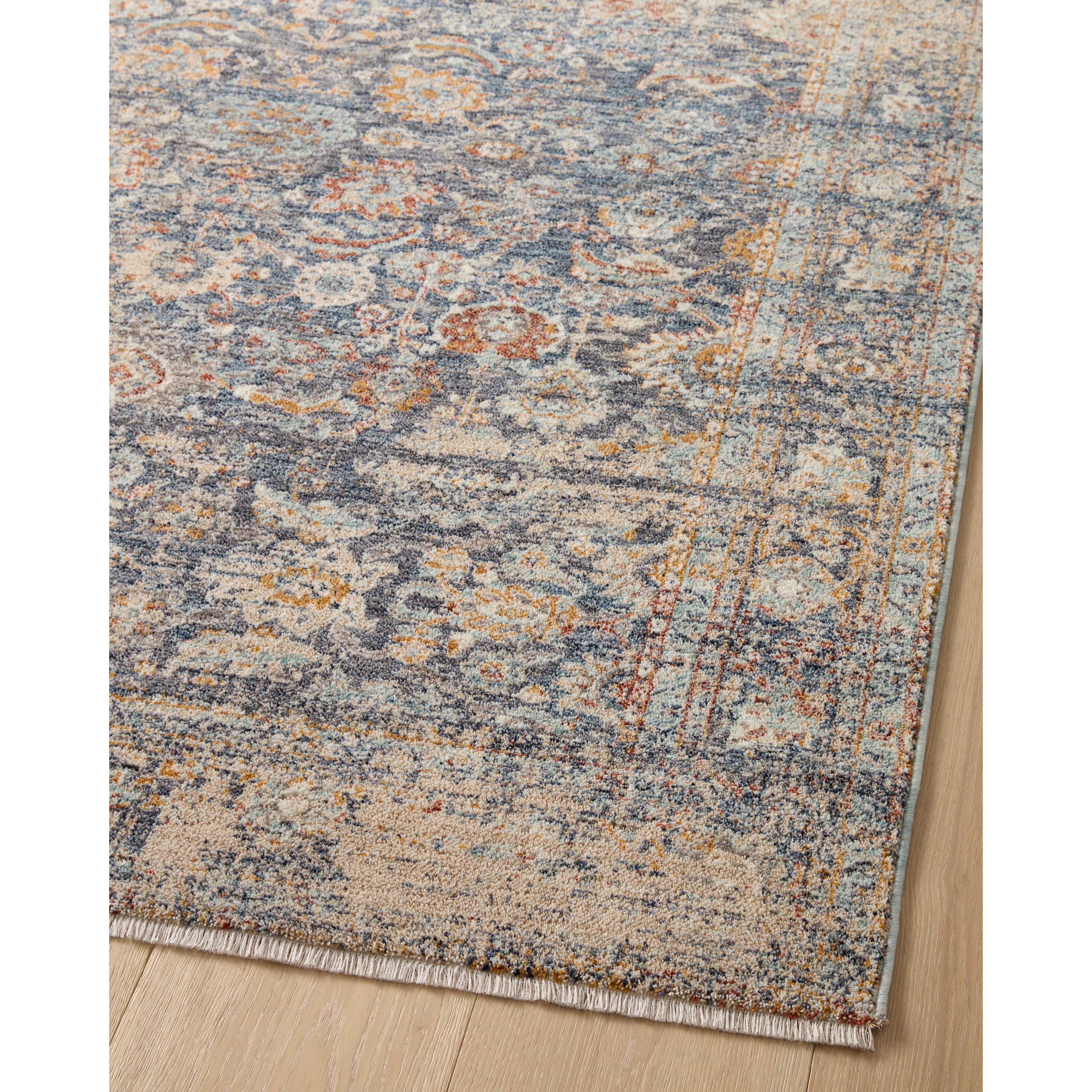 Designed in an expertly distressed antique style, the Angela Rose x Loloi Blake Navy / Multi rug features traditional motifs that have softened into the background, making it an effortless neutral in any room. Muted earth-toned palettes complement a range of furniture, while subtle cream-colored fringe at the edges add texture and framing. Amethyst Home provides interior design services, furniture, rugs, and lighting in the Portland metro area.