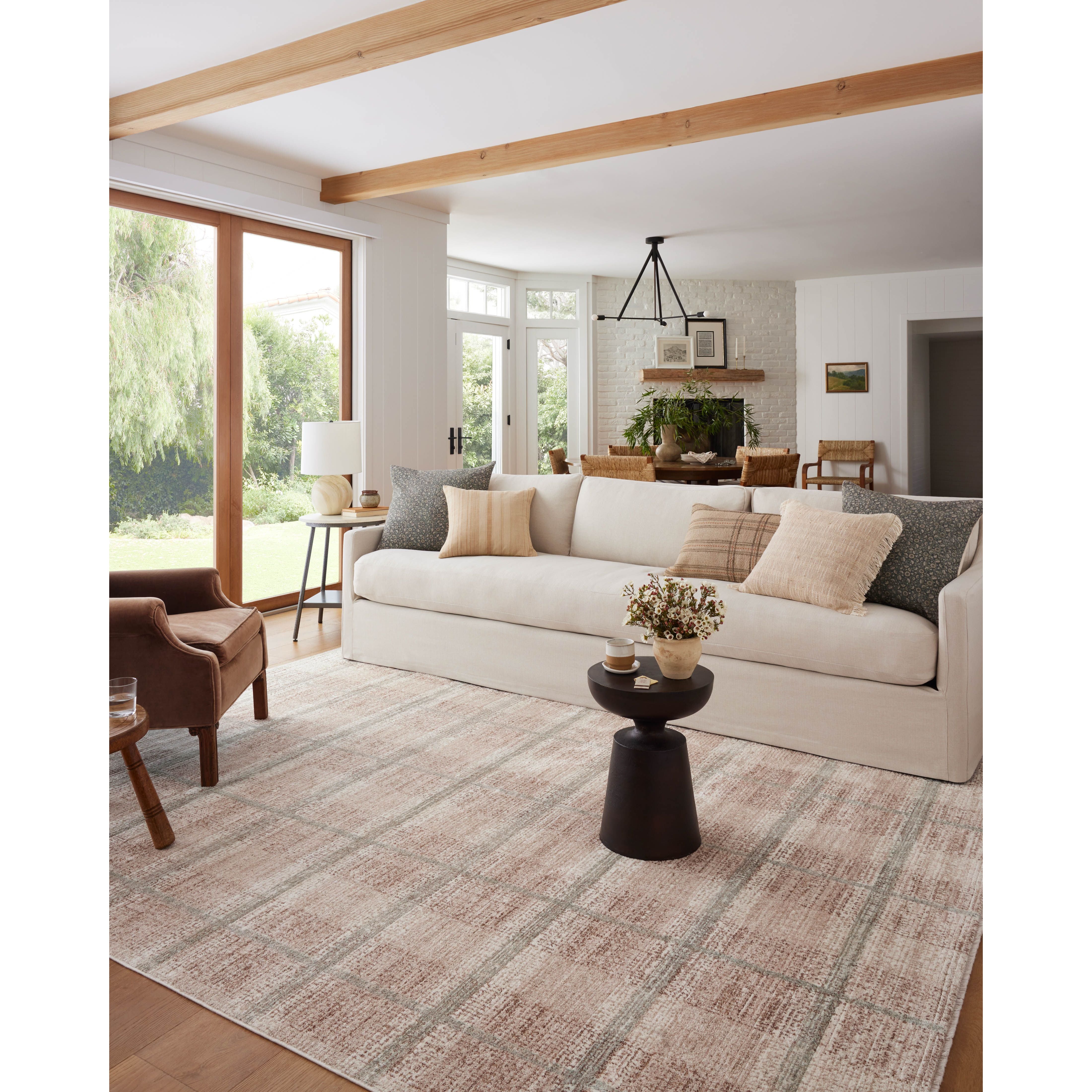 Featuring Angela Rose x Loloi Ember Clay / Mist Rug by Loloi at Amethyst Home. The Ember Clay / Mist rug by Angela Rose x Loloi is a modern flatweave area rug with a timeless plaid pattern that adds depth and coziness to any living room, bedroom, dining room, or hallway. Ember is power-loomed of 100% space-dyed polyester, a durable construction that cre. Amethyst Home provides interior design, new home construction design consulting, vintage area rugs, and lighting in the Newport Beach metro area.