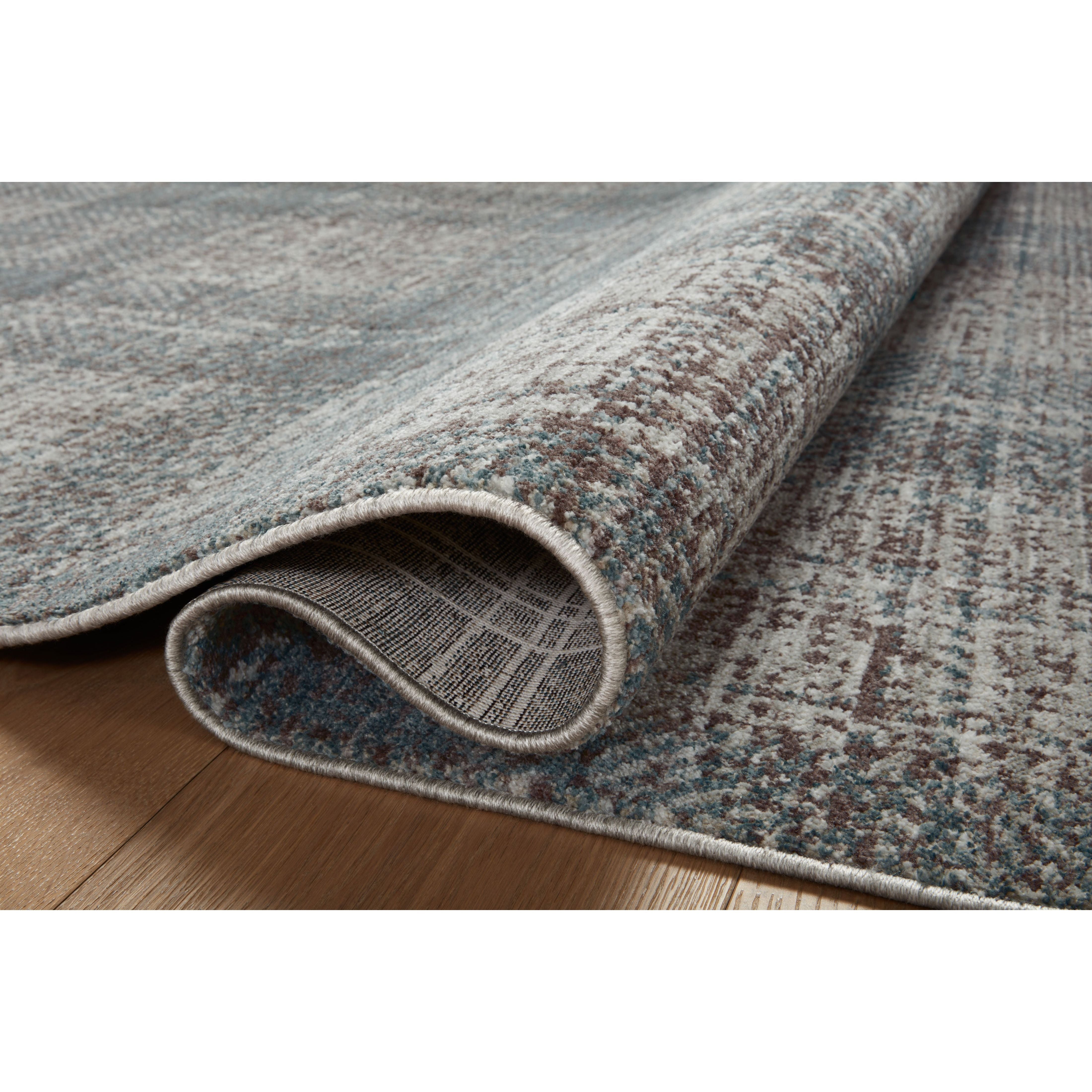 Featuring Angela Rose x Loloi Ember Denim / Charcoal Rug by Loloi at Amethyst Home. The Ember Denim / Charcoal rug by Angela Rose x Loloi is a modern flatweave area rug with a timeless plaid pattern that adds depth and coziness to any living room, bedroom, dining room, or hallway. Ember is power-loomed of 100% space-dyed polyester, a durable construction th. Amethyst Home provides interior design, new home construction design consulting, vintage area rugs, and lighting in the San Diego metro area.