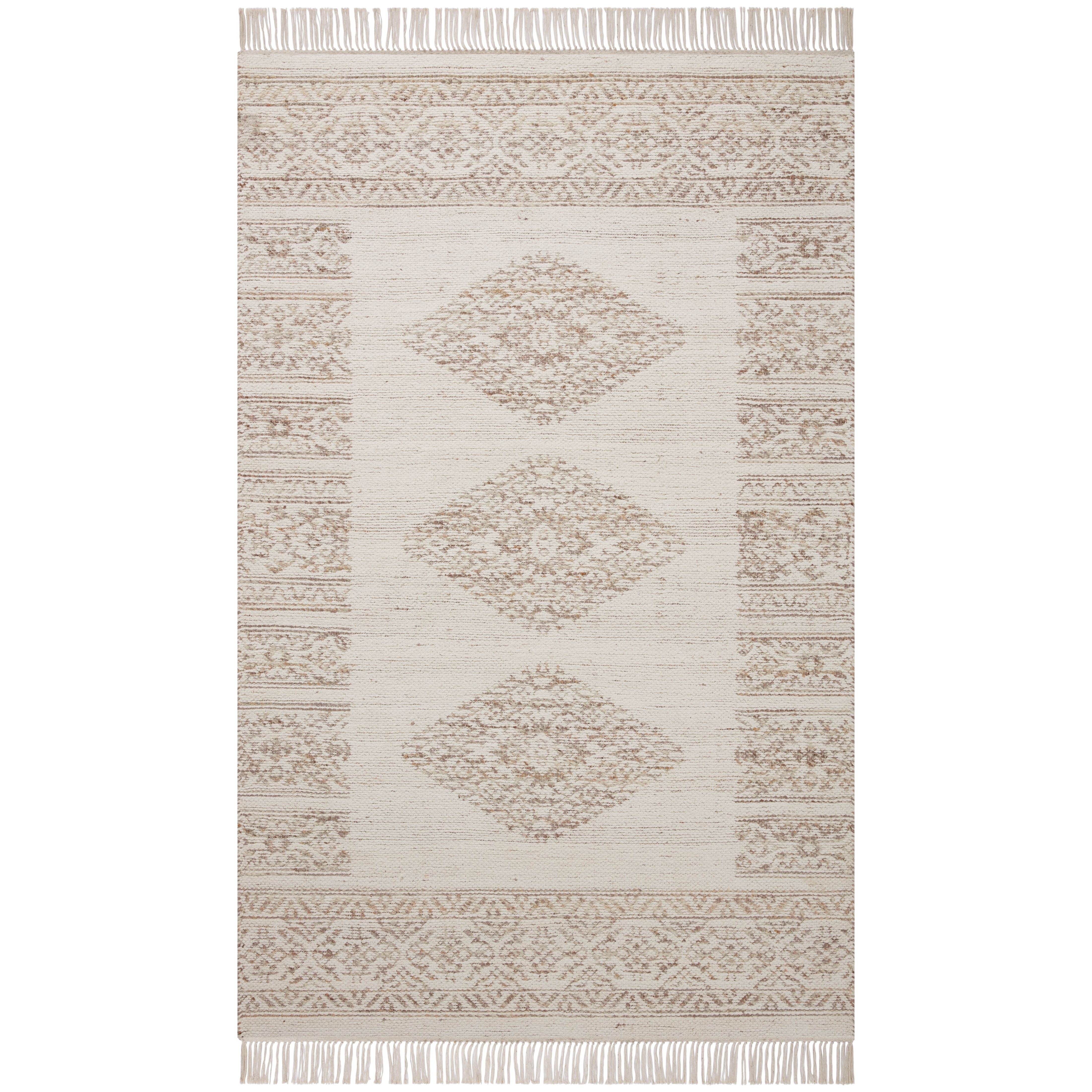 The Rivers Collection by Angela Rose x Loloi is a modern flatweave area rug with a reversible design featuring symmetrical motifs. Woven of wool, cotton, and jute, Rivers combines natural materials with an airy, natural aesthetic. The soft colors of the rug create a watercolor effect that adds artful depth to the neutral palette. Amethyst Home provides interior design, new home construction design consulting, vintage area rugs, and lighting in the Winter Garden metro area.