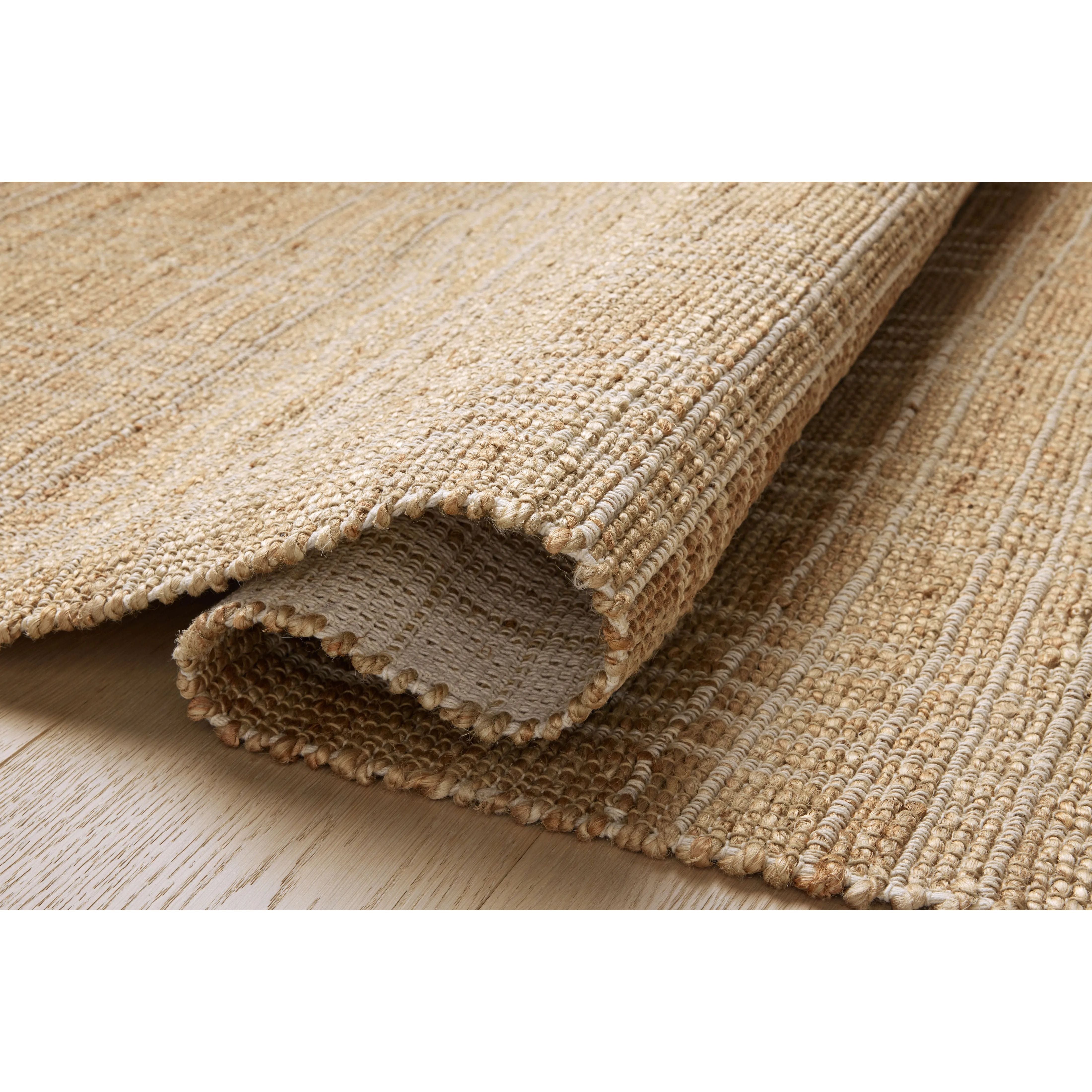 Featuring Chris Loves Julia x Loloi Judy Natural / Cream Rug by Loloi at Amethyst Home. Hand Woven76% Jute l 24% CottonJUD-01 Natural / CreamPile Height: 0.5". Amethyst Home provides interior design, new home construction design consulting, vintage area rugs, and lighting in the Los Angeles metro area.