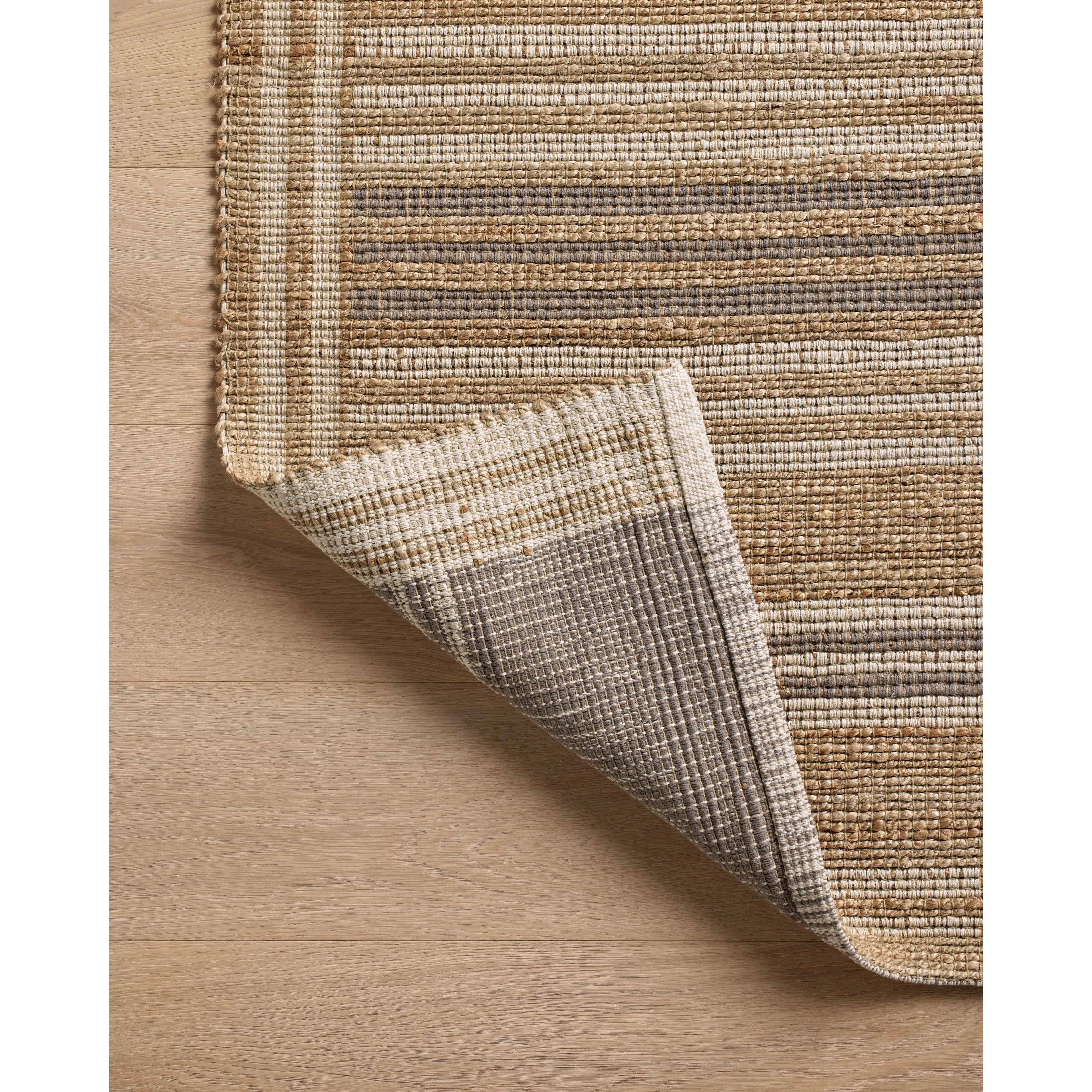 Featuring Chris Loves Julia x Loloi Judy Natural / Dove Rug by Loloi at Amethyst Home. Hand Woven76% Jute l 24% CottonJUD-03 Natural / DovePile Height: 0.5". Amethyst Home provides interior design, new home construction design consulting, vintage area rugs, and lighting in the Kansas City metro area.