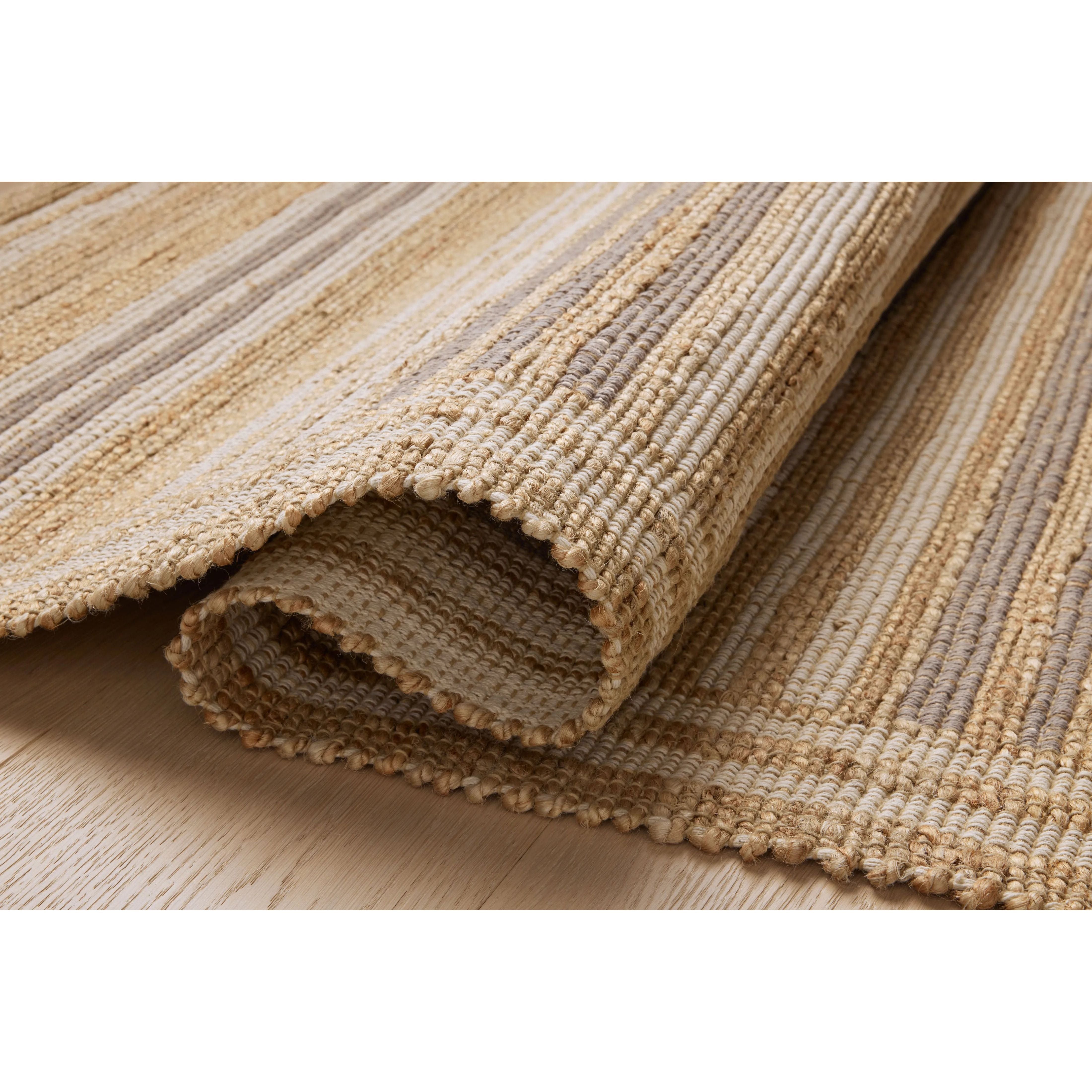 Featuring Chris Loves Julia x Loloi Judy Natural / Dove Rug by Loloi at Amethyst Home. Hand Woven76% Jute l 24% CottonJUD-03 Natural / DovePile Height: 0.5". Amethyst Home provides interior design, new home construction design consulting, vintage area rugs, and lighting in the Tampa metro area.