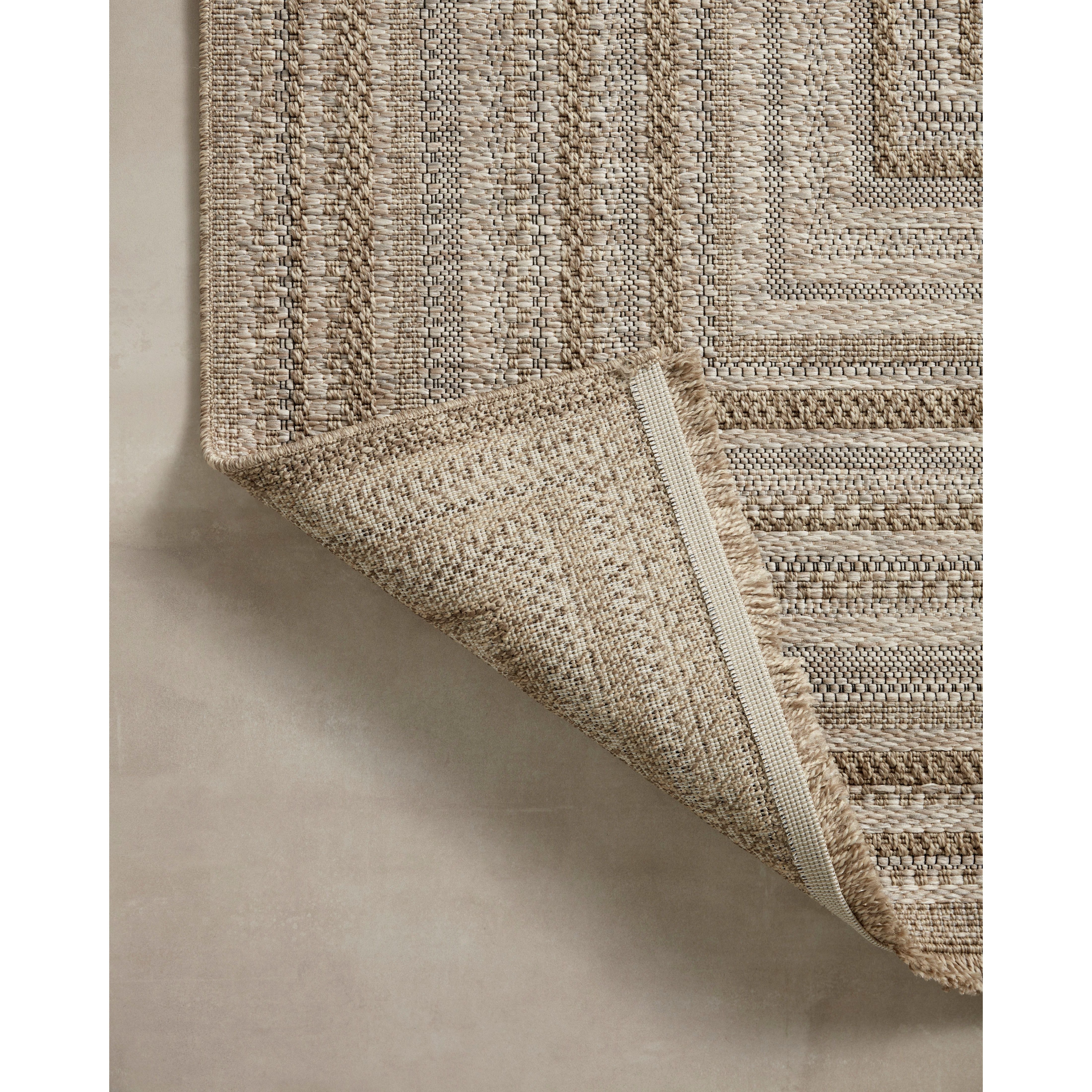 Made for sunny days ahead, the Dawn Natural DAW-01 rug is an indoor/outdoor rug that looks like a woven sisal rug but is power-loomed of 100% polypropylene, which makes it water- and mildew-resistant (so it's ready for rainy days ahead, too). Amethyst Home provides interior design, new home construction design consulting, vintage area rugs, and lighting in the Scottsdale metro area.