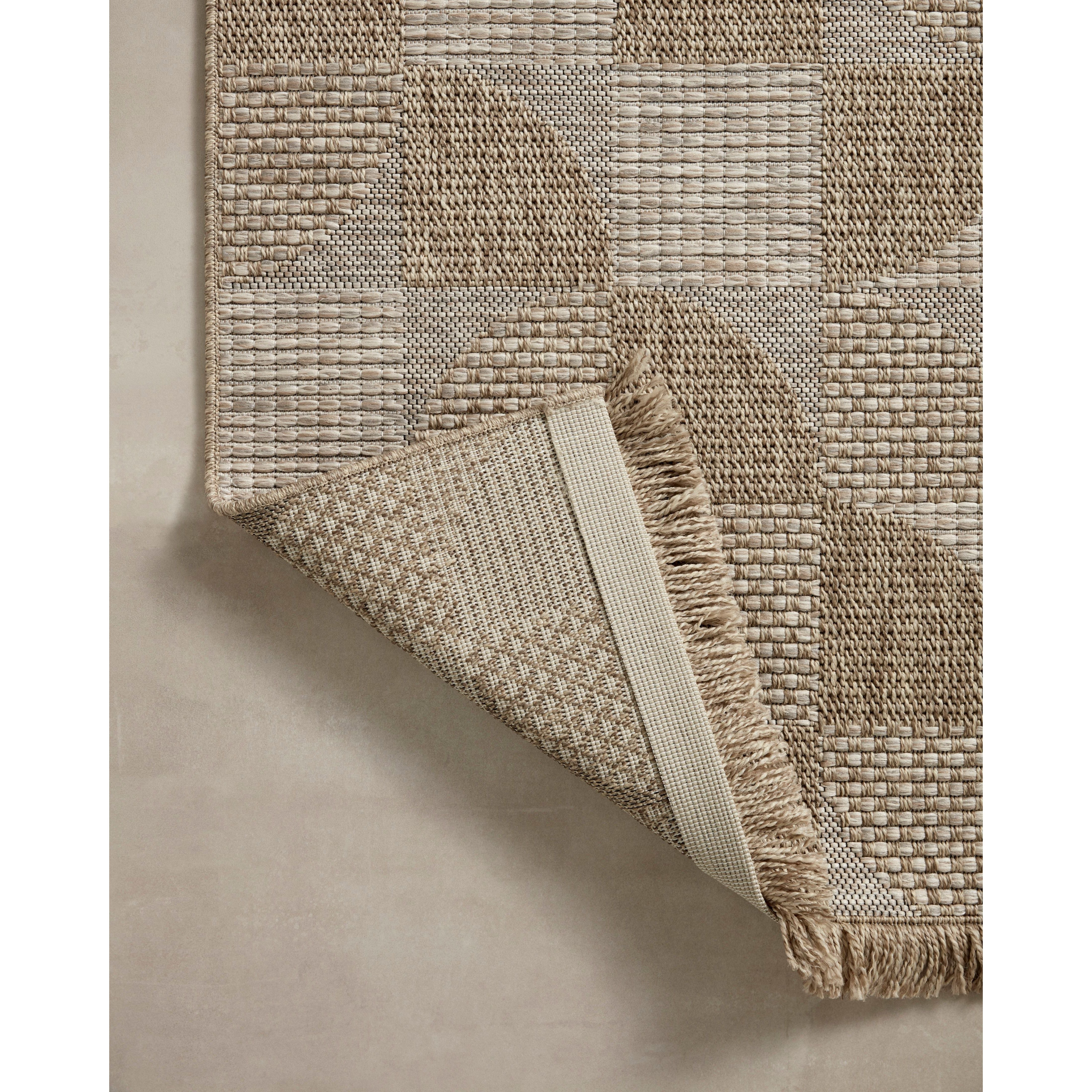 Featuring Dawn Natural DAW-08 Indoor/Outdoor Rug by Loloi at Amethyst Home. Made for sunny days ahead, the Dawn Collection is an indoor/outdoor rug that looks like a woven sisal rug but is power-loomed of 100% polypropylene, which makes it water- and mildew-resistant (so it's ready for rainy days ahead, too). Available in modern graphic patterns in tonal bei. Amethyst Home provides interior design, new home construction design consulting, vintage area rugs, and lighting in the Portland metro area.