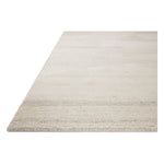 Featuring Elodie Ivory / Oatmeal Hand-Knotted Rug by Loloi at Amethyst Home. The hand-knotted Elodie Ivory / Oatmeal rug collection uses space-dyed yarns to create dynamic variability in a range of heathered neutrals with a tone-on-tone design. Elodie is also uniquely textured and soft, made of New Zealand wool and nylon blended yarns. A luxurious area rug wit. Amethyst Home provides interior design, new home construction design consulting, vintage area rugs, and lighting in the Denver metro area.