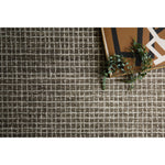 Featuring Giana Charcoal Rug by Loloi at Amethyst Home. Inspired by textural watercolors, the Giana Charcoal Rug from Loloi combines a relaxed grid with soft variations of grey and ivory for an effortless and sophisticated look. Each rug is hooked of 100% wool by artisans for a beautiful textural layer to your home. The soft textures of this rug bring warmth and coz. Amethyst Home provides interior design, new construction, custom furniture, and rugs for the Austin, Dallas, and Houston metro area.