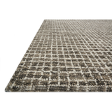 Featuring Giana Charcoal Rug by Loloi at Amethyst Home. Inspired by textural watercolors, the Giana Charcoal Rug from Loloi combines a relaxed grid with soft variations of grey and ivory for an effortless and sophisticated look. Each rug is hooked of 100% wool by artisans for a beautiful textural layer to your home. The soft textures of this rug bring warmth and coziness to any room. Amethyst Home provides interior design, new construction, custom furniture, and rugs for the Scottsdale metro area.