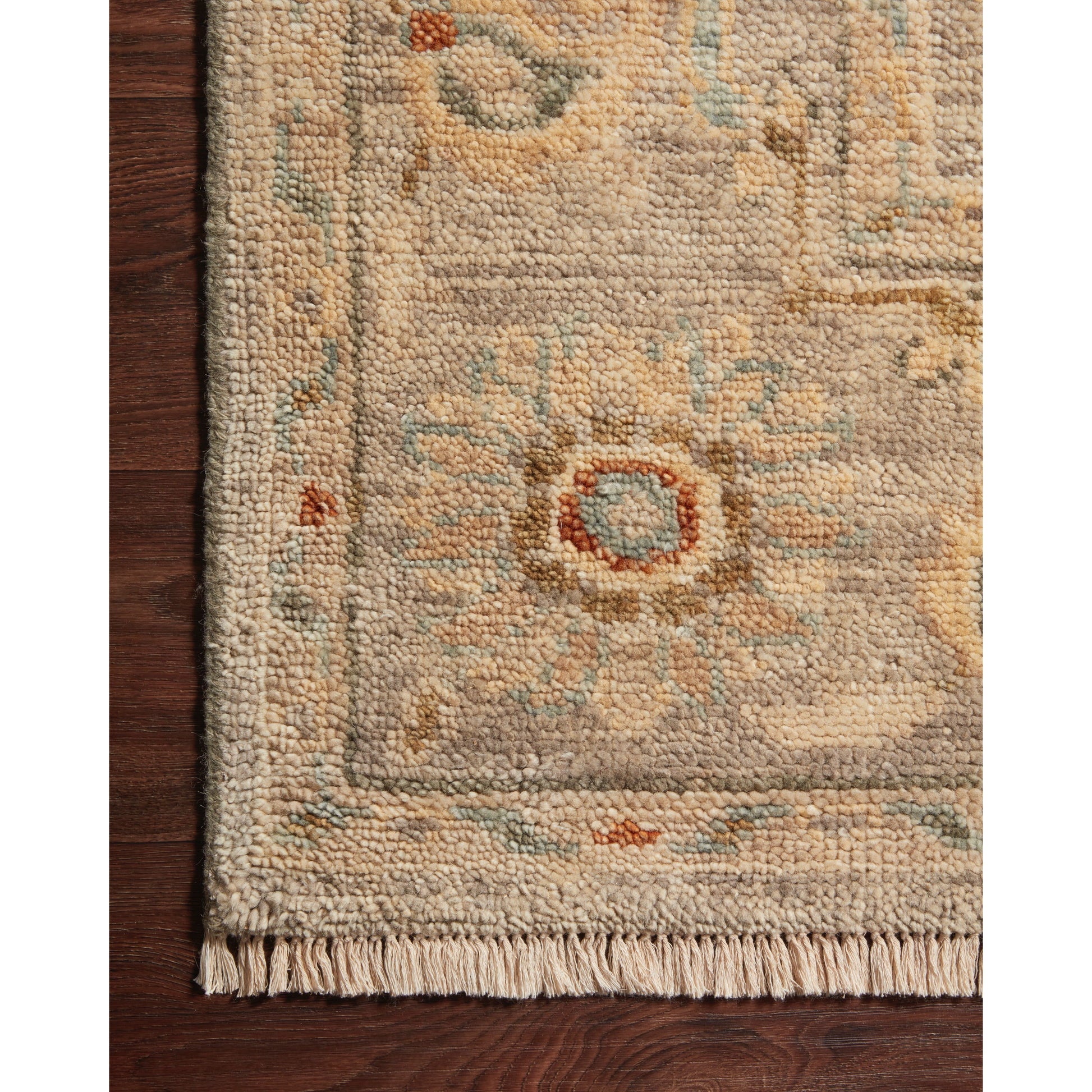 The Helena Light Grey / Multi HEL-02 rug from Loloi is hand-knotted of 100% wool, refined, yet versatile for any home. The Helena rug combines weathered tones and worldly patterns for a beautiful grounding element in any room. Amethyst Home provides interior design, new construction, custom furniture, and rugs for the Des Moines and Cedar Rapids metro area.