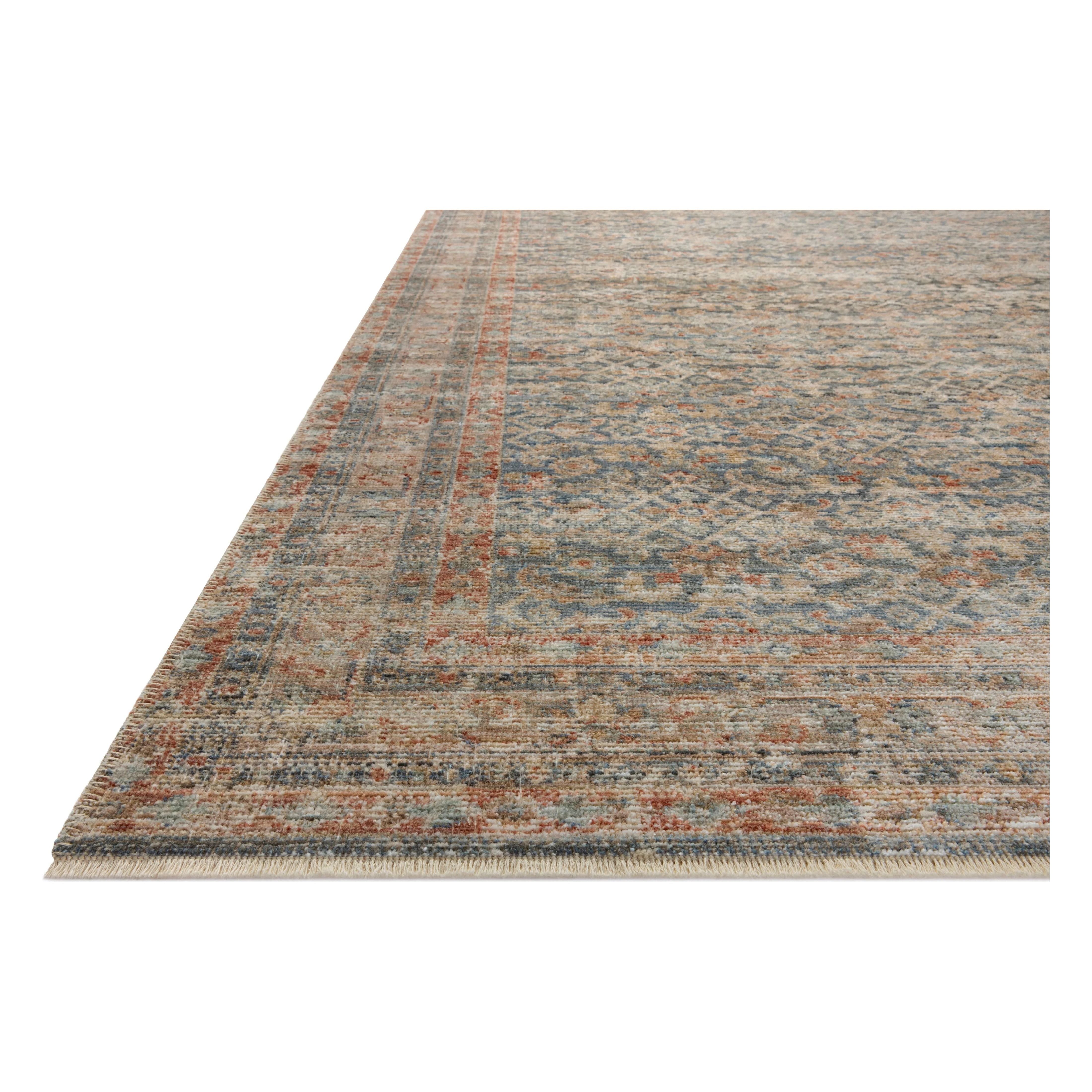Featuring Heritage Blue / Rust Rug by Loloi at Amethyst Home. Heritage is Loloi’s best collection yet. Inspired by Amir Loloi’s favorite vintage rugs, the collection recreates a vintage aesthetic and variable-pile texture using a new craft process that was invented specifically for this rug—a process that took over two years to complete. Motifs in Heritage. Amethyst Home provides interior design, new home construction design consulting, vintage area rugs, and lighting in the Scottsdale metro area.