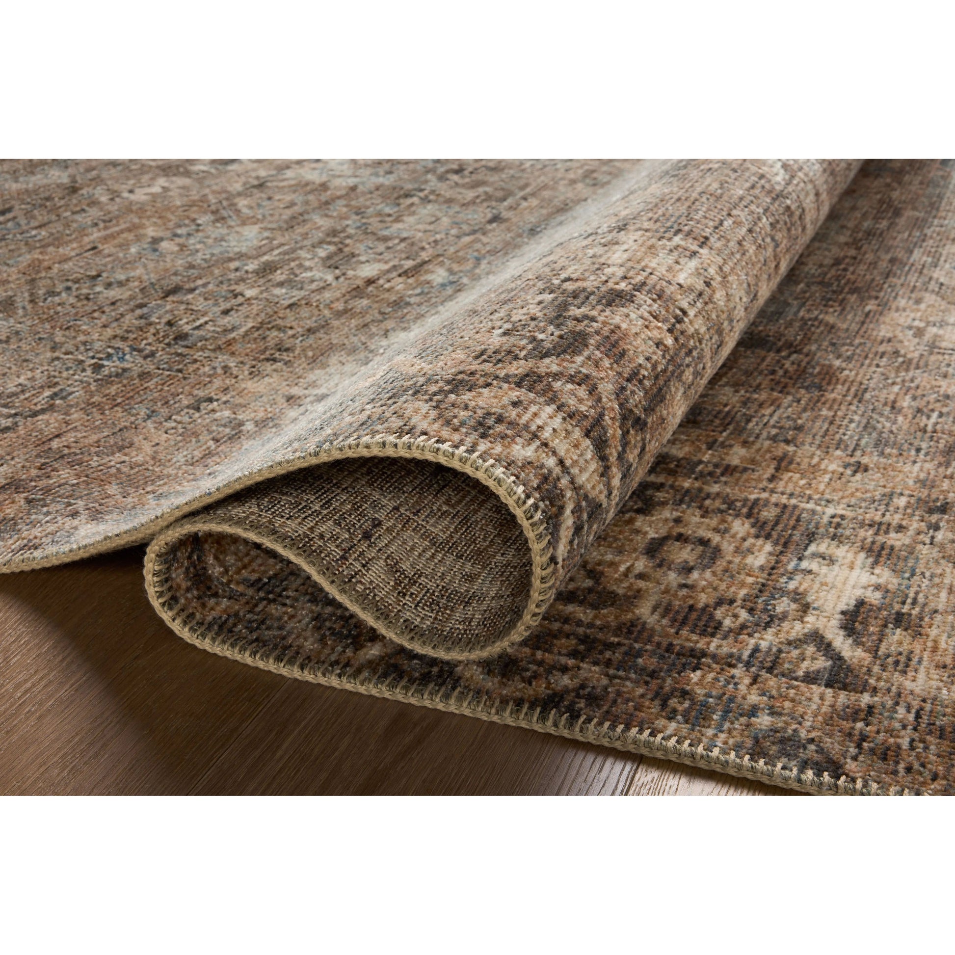 Heritage is Loloiâ€™s best collection yet. Inspired by Amir Loloiâ€™s favorite vintage rugs, the collection recreates a vintage aesthetic and variable-pile texture using a new craft process that was invented specifically for this rugâ€”a process that took over two years to complete. Amethyst Home provides interior design, new home construction design consulting, vintage area rugs, and lighting in the Tampa metro area.
