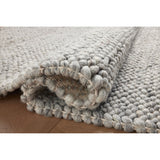 Featuring Jean Stoffer x Loloi Hendrick Grey Rug by Loloi at Amethyst Home. The Hendrick Grey Rug is a beautifully textured wool area rug with an elevated ease reminiscent of a cozy handmade sweater. The rug is very plush underfoot, making it equally welcome in bedrooms and living rooms. The hand-woven weave pattern adds dimension while the rug’s color palette is soft, neutra. Amethyst Home provides interior design, new construction, custom furniture, and area rugs in the Winter Garden metro area.