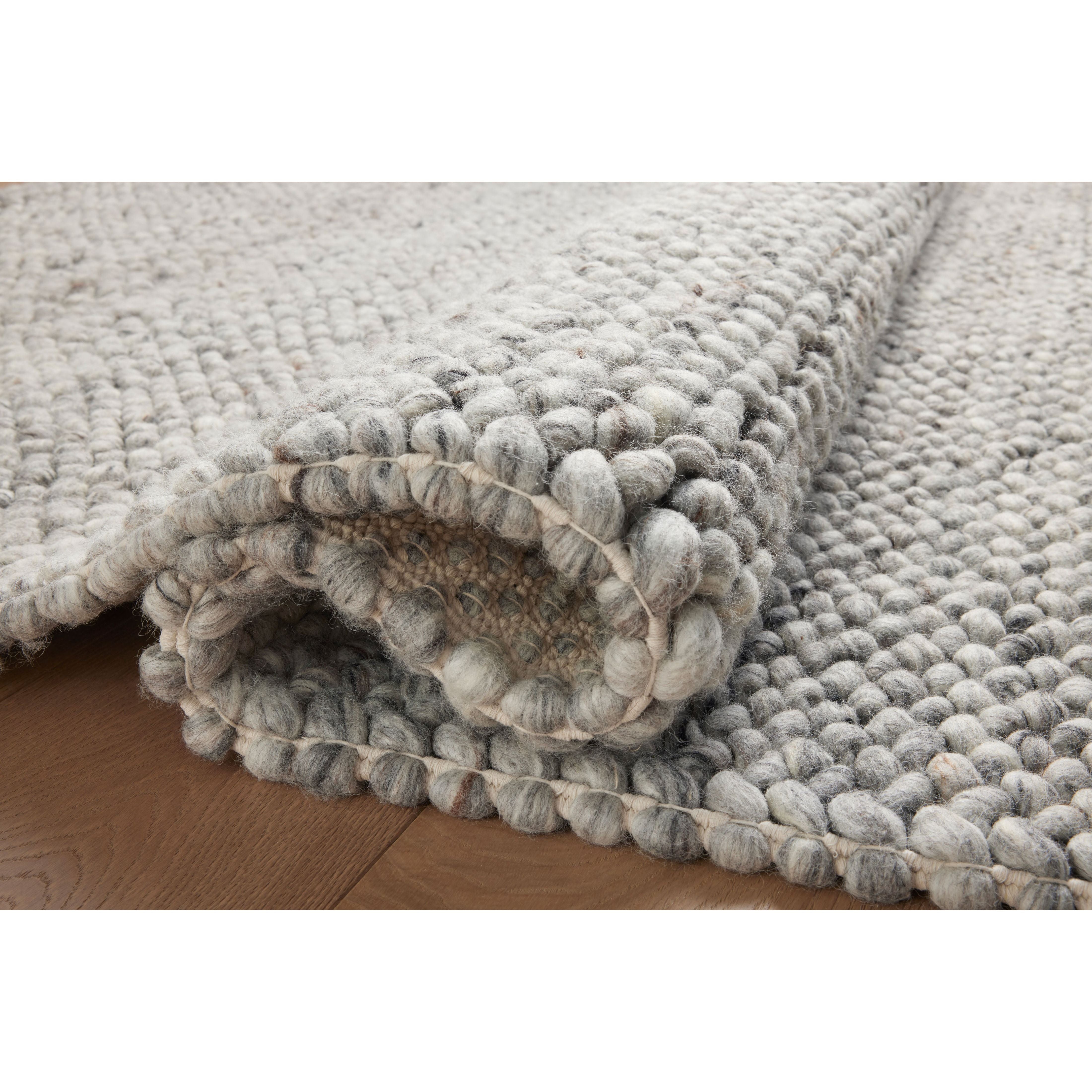 Featuring Jean Stoffer x Loloi Hendrick Grey Rug by Loloi at Amethyst Home. The Hendrick Grey Rug is a beautifully textured wool area rug with an elevated ease reminiscent of a cozy handmade sweater. The rug is very plush underfoot, making it equally welcome in bedrooms and living rooms. The hand-woven weave pattern adds dimension while the rug’s color palette is soft, neutra. Amethyst Home provides interior design, new construction, custom furniture, and area rugs in the Winter Garden metro area.