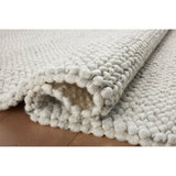 Featuring Jean Stoffer x Loloi Hendrick Ivory Rug by Loloi at Amethyst Home. The Hendrick Ivory Rug is a beautifully textured wool area rug with an elevated ease reminiscent of a cozy handmade sweater. The rug is very plush underfoot, making it equally welcome in bedrooms and living rooms. The hand-woven weave pattern adds dimension while the rug’s color palette is soft, neutral. Amethyst Home provides interior design, new construction, custom furniture, and area rugs in the Scottsdale metro area.